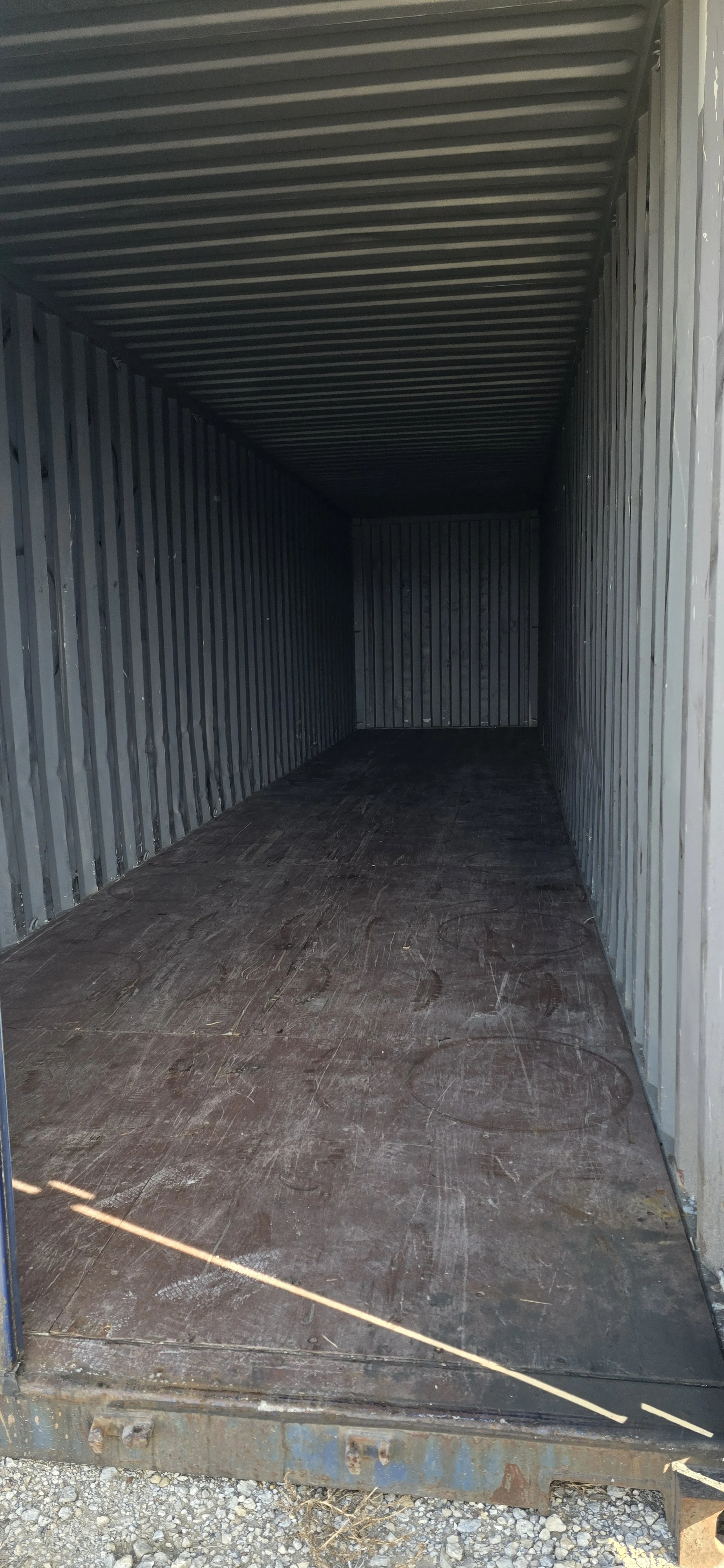 Interior of a used 40 ft storage container with steel walls and solid flooring, ideal for equipment or jobsite storage in Fort Worth, Texas.