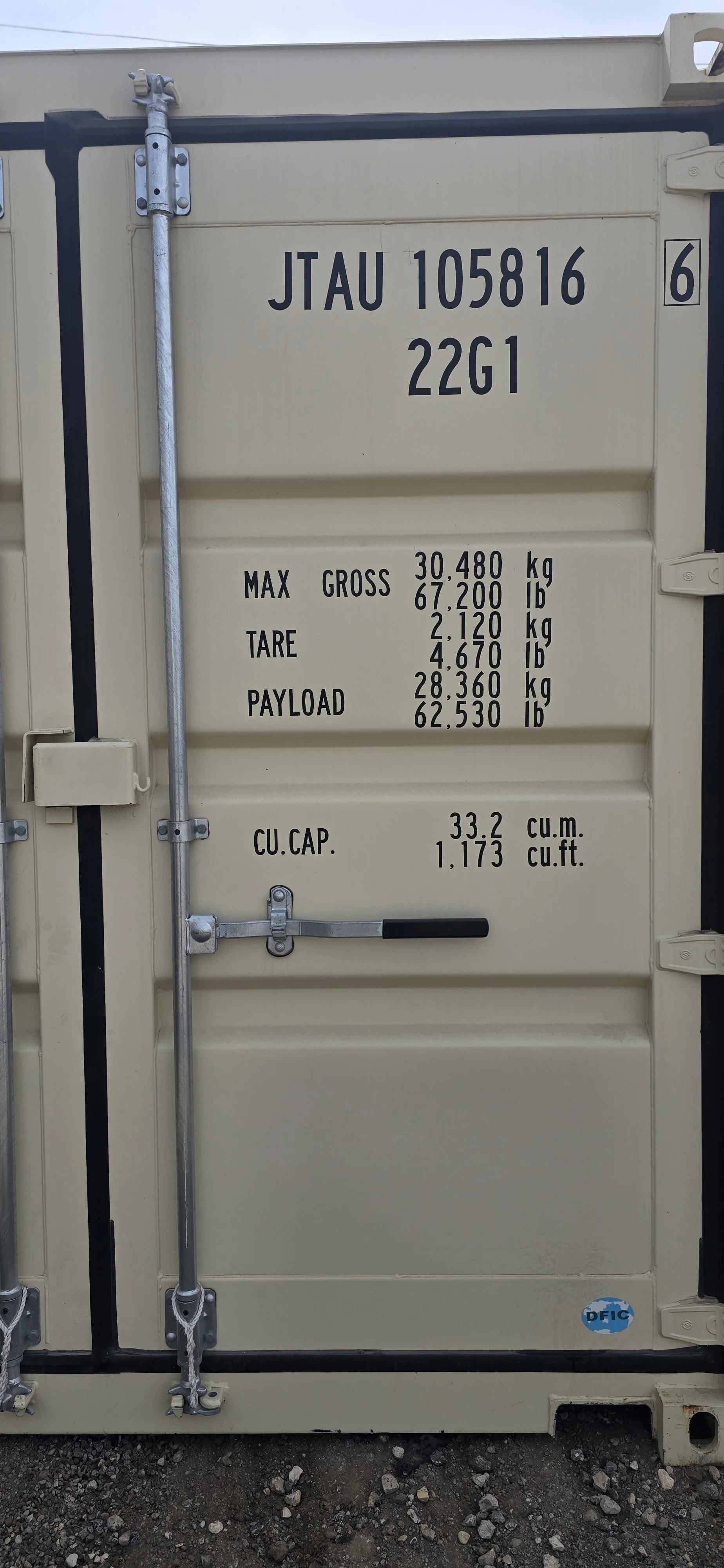 close up of shipping container hinge and locking bars easy open door system