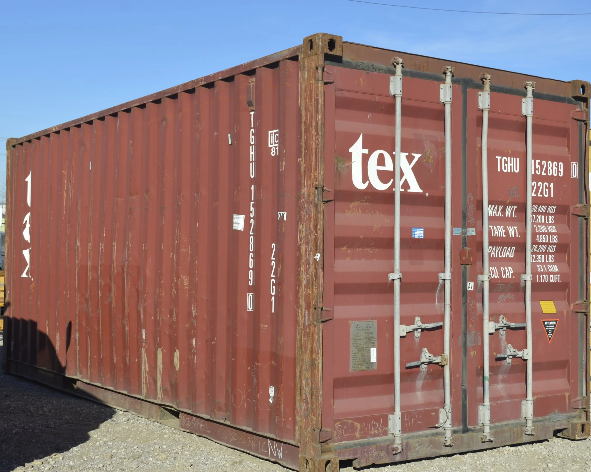 Used 20 ft storage container in Fort Worth, TX with yellow steel exterior, double swing doors, and visible corner casting. Wind and water tight condition.