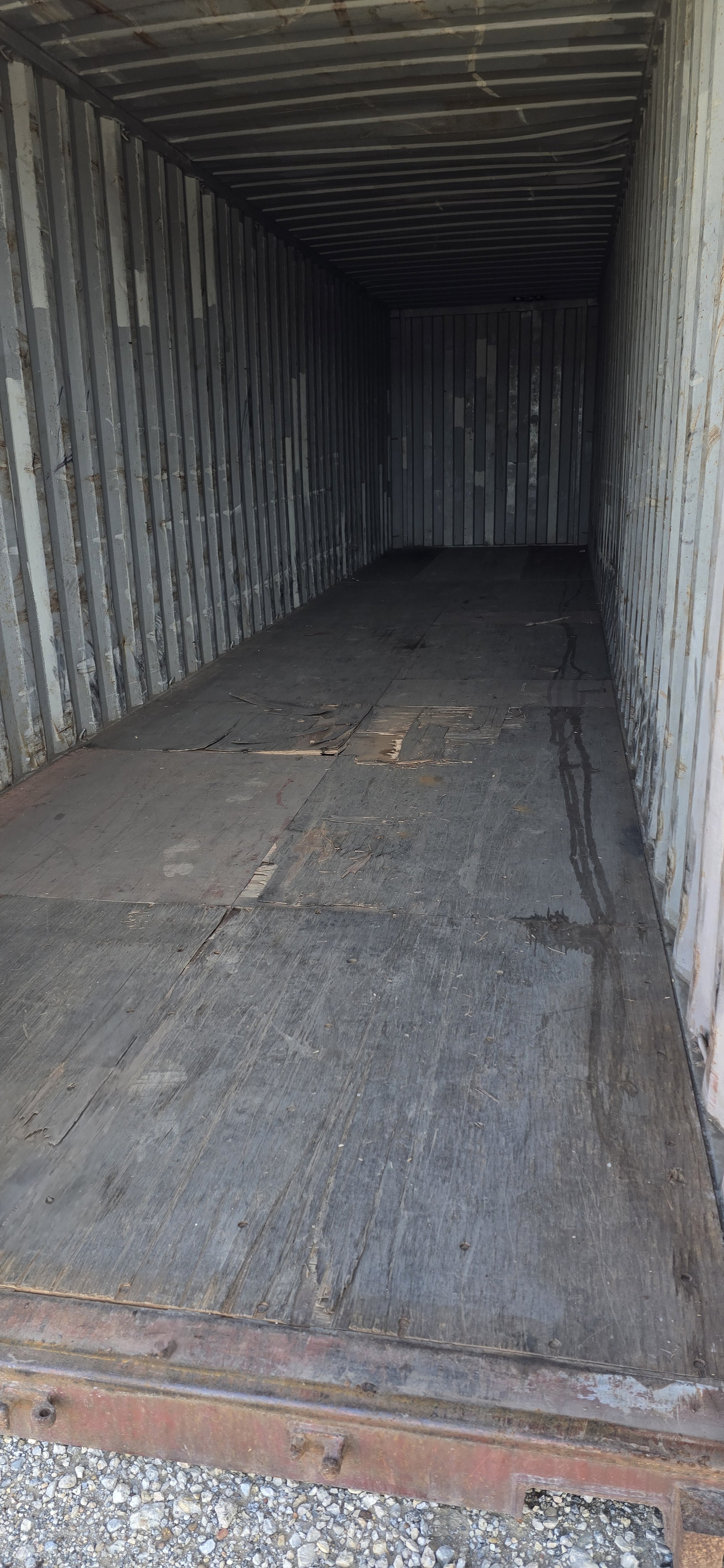 Interior of a used 40 ft storage container with steel walls and solid flooring, ideal for equipment or jobsite storage in Fort Worth, Texas.