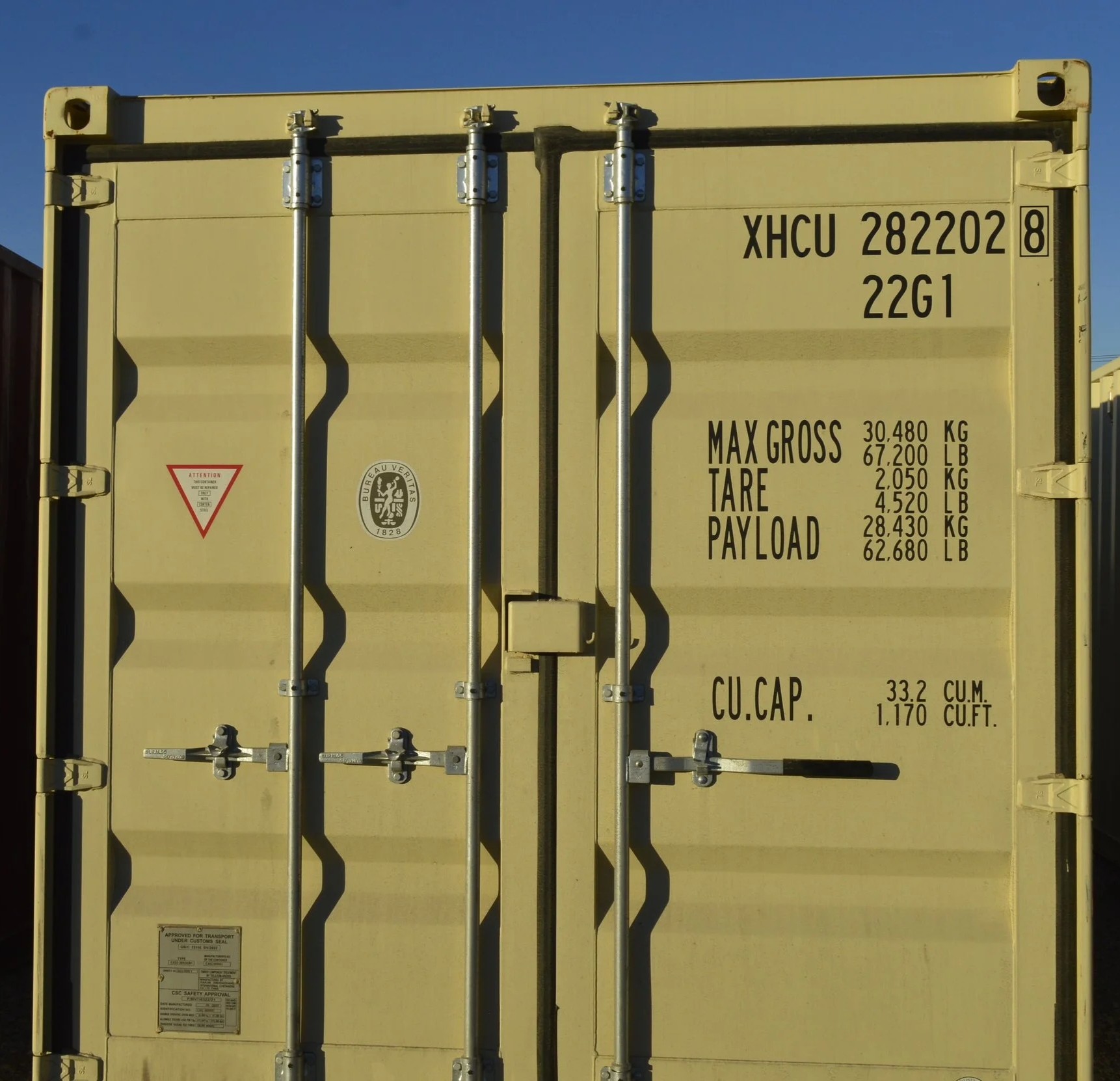 Close-up of double door locking mechanism on a one trip 20 ft steel storage container in Fort Worth, TX, showing durable hardware and solid construction.