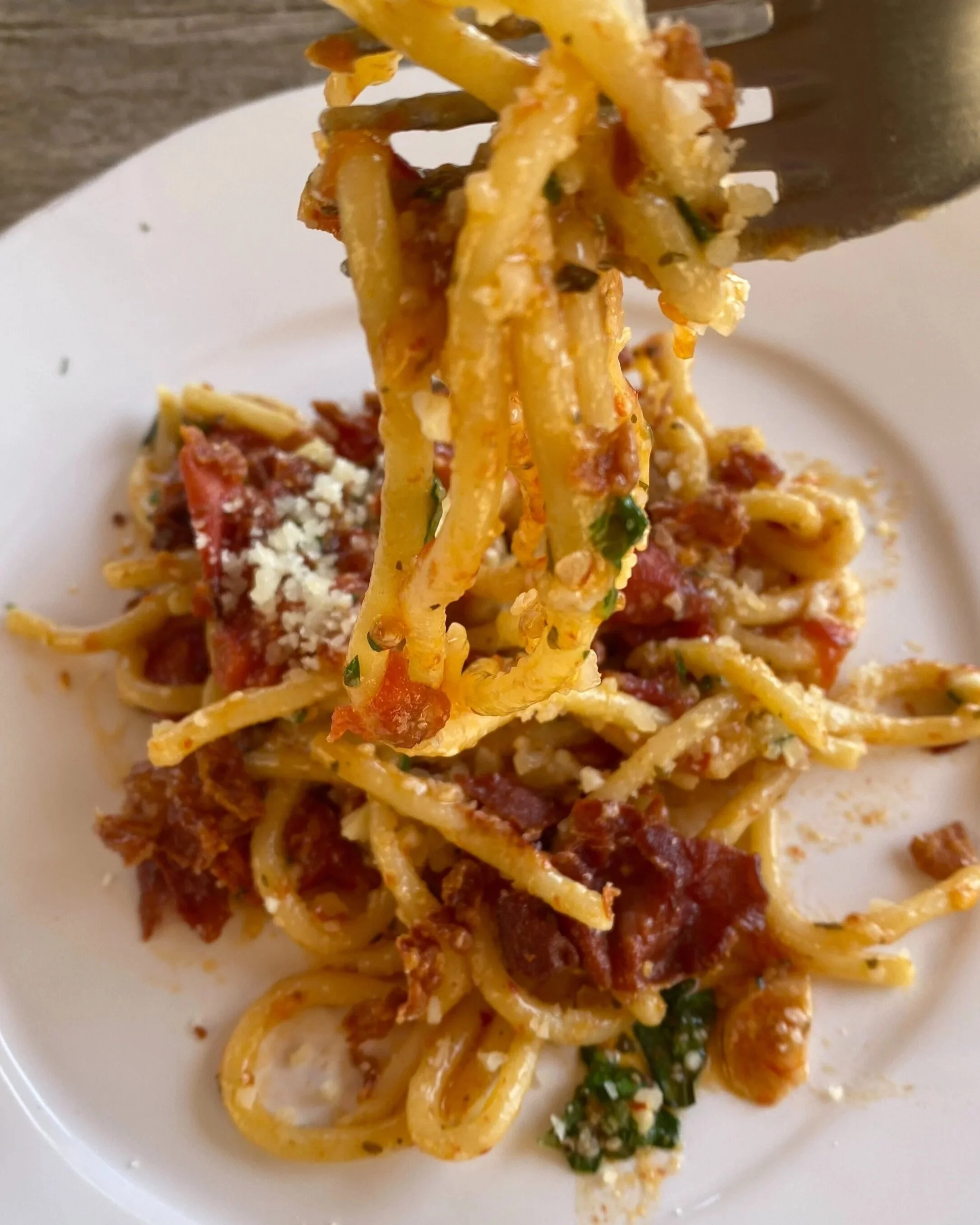 Pici with Tomatoes and Prosciutto paired with wine