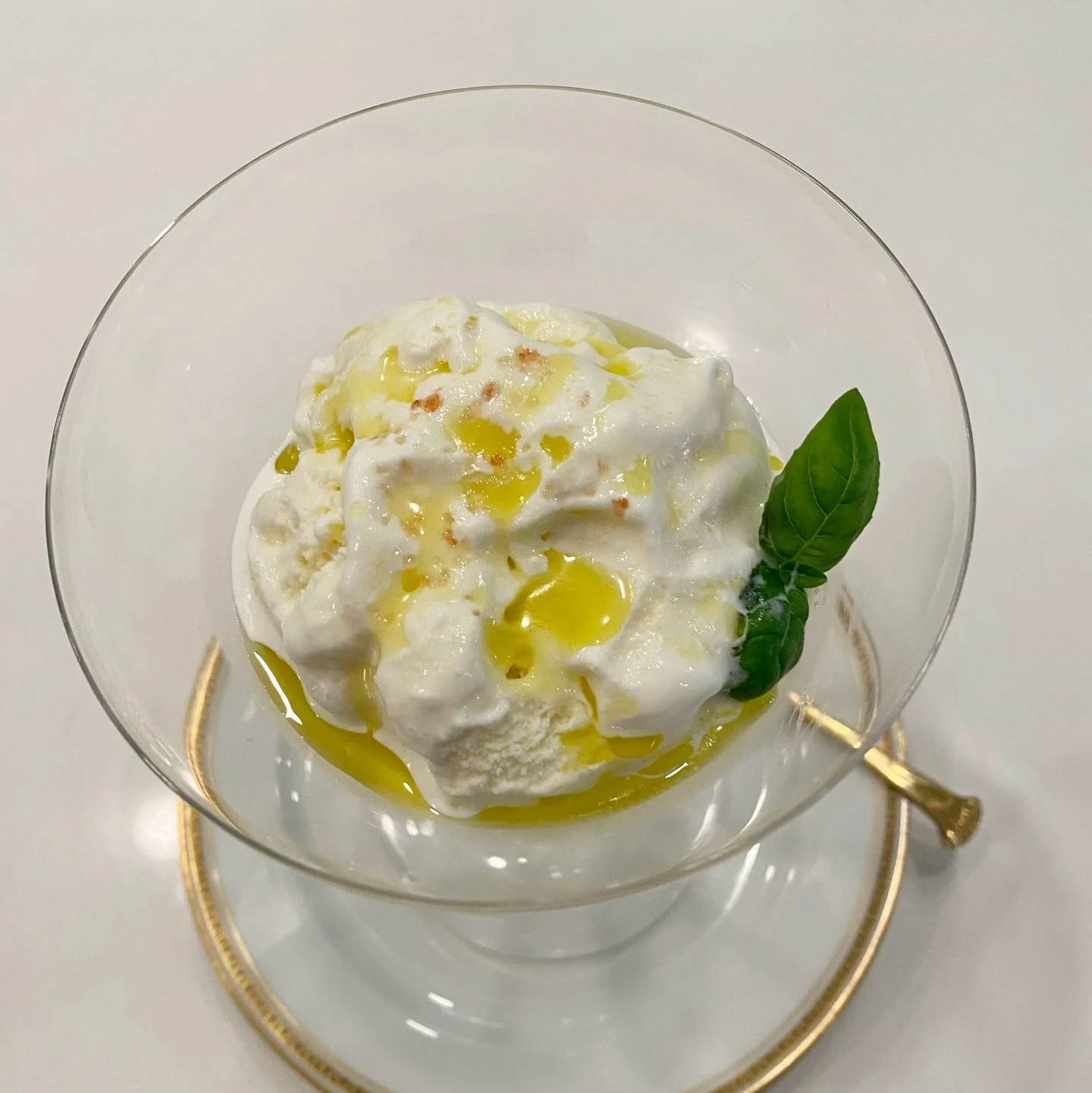 Simplicity can be revolutionary, as this Ice Cream Delight demonstrates. Extra Virgin Olive Oil takes the spotlight, celebrated and respected as the high-quality liquid gold it truly is.

How to!
For 4
28 ounces (828 grams) high-quality vanilla ice c