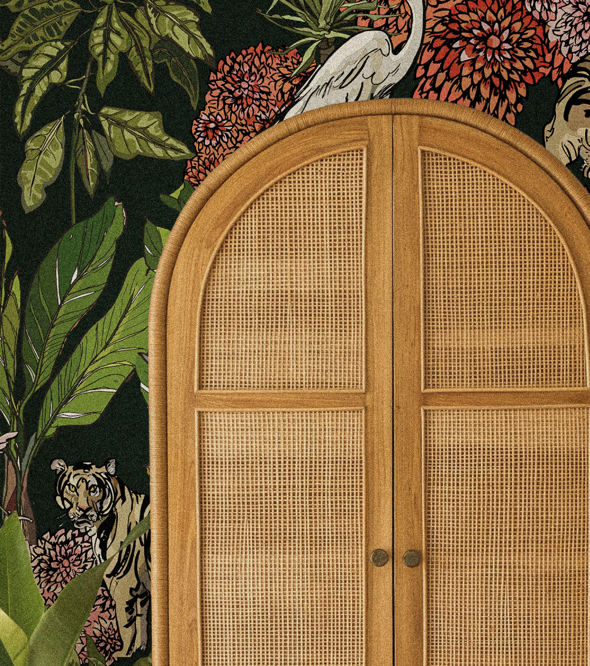 Photo of an armoire with a bold jungle wallpaper in one of the guest rooms.