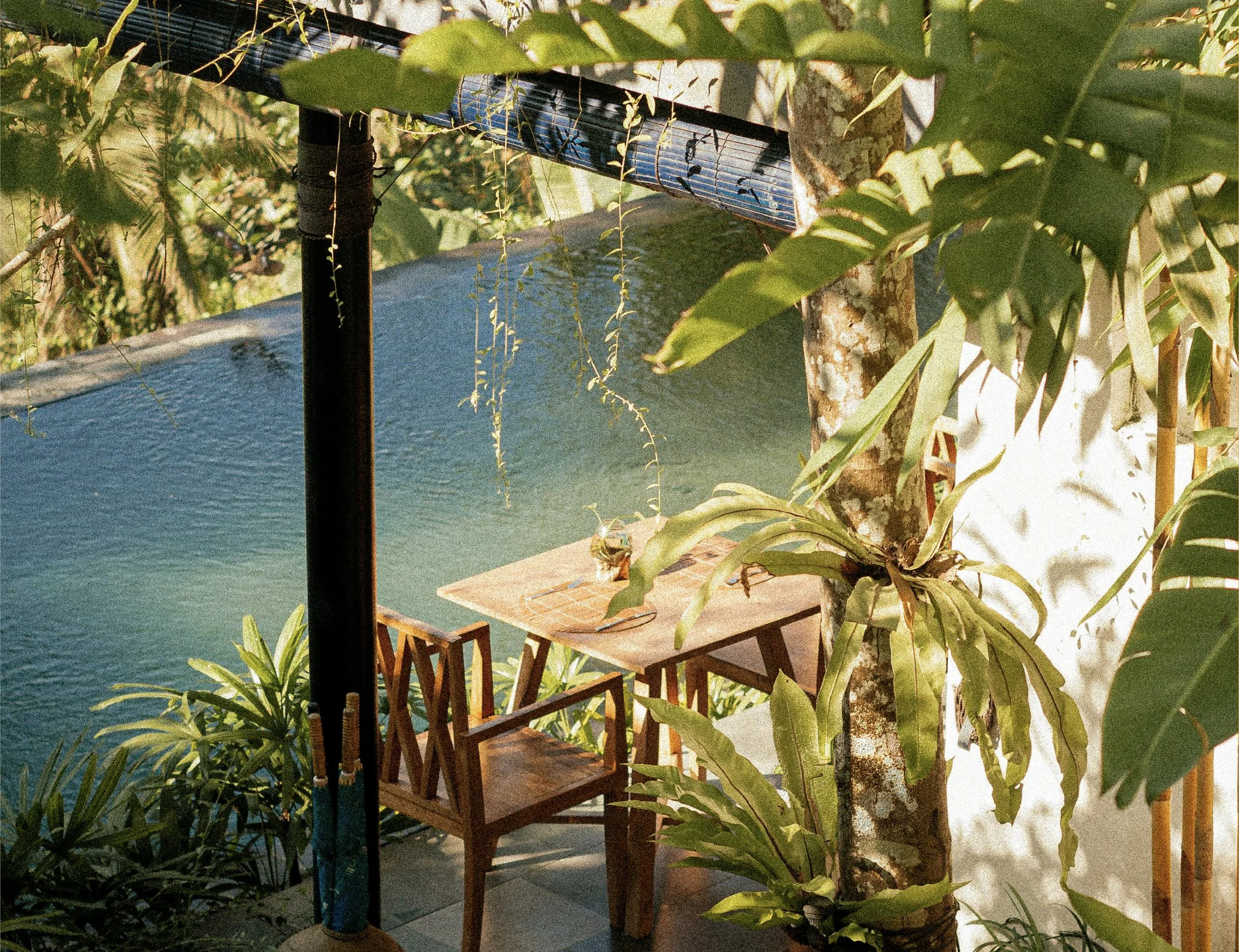 An exterior view of Casa Solana's private balcony with an intimate setting and view of the water.