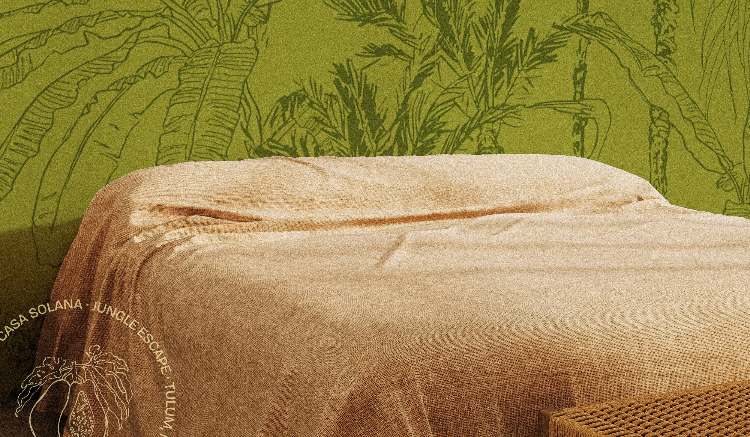 View of a lived-in guest bedroom with a vibrant and bold jungle pattern.