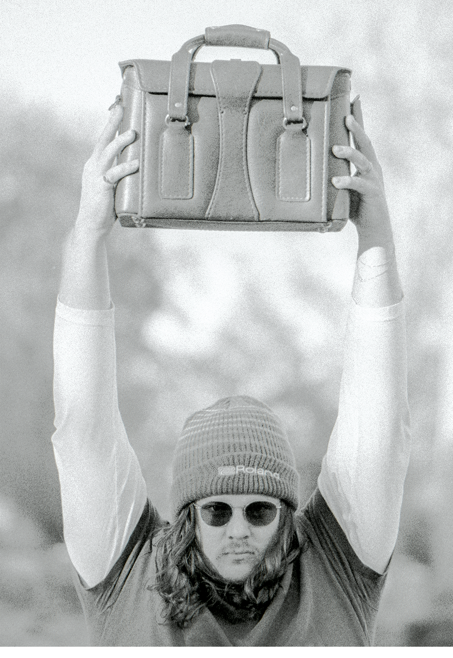 Chasen Rivard poses with a camera bag, shot on Kodak P3200 TMax film and a Nikon F5 with Tamron 85mm f1.8 VC USD