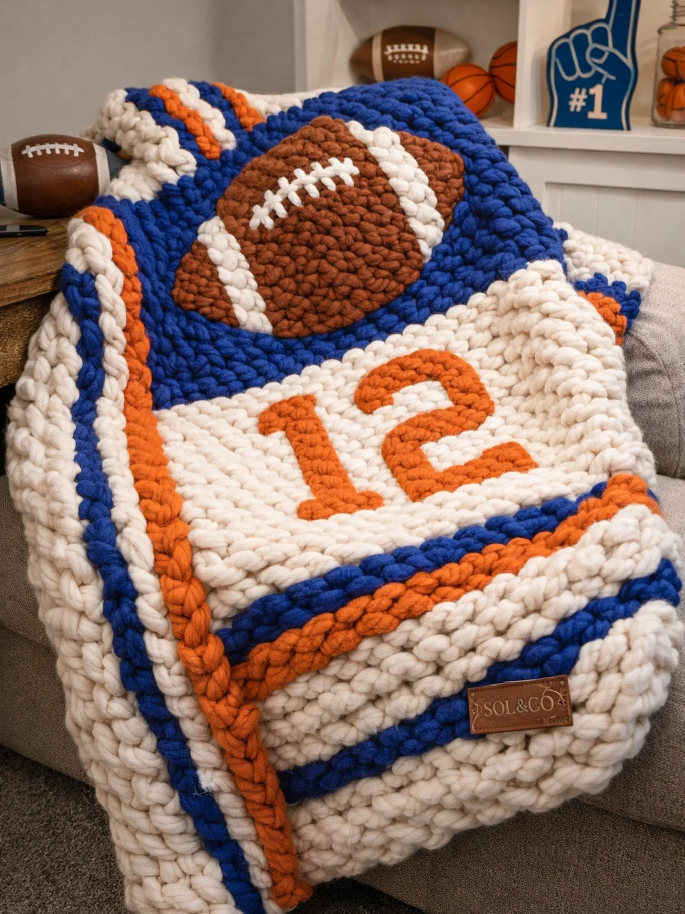 Game day, but make it cozy. 🏈Custom sports-inspired chunky knits bring warmth, comfort, and timeless style to every season. Whether it&rsquo;s kickoff, playoffs, or a quiet night on the couch, create your custom game day knit today

Made to order. B