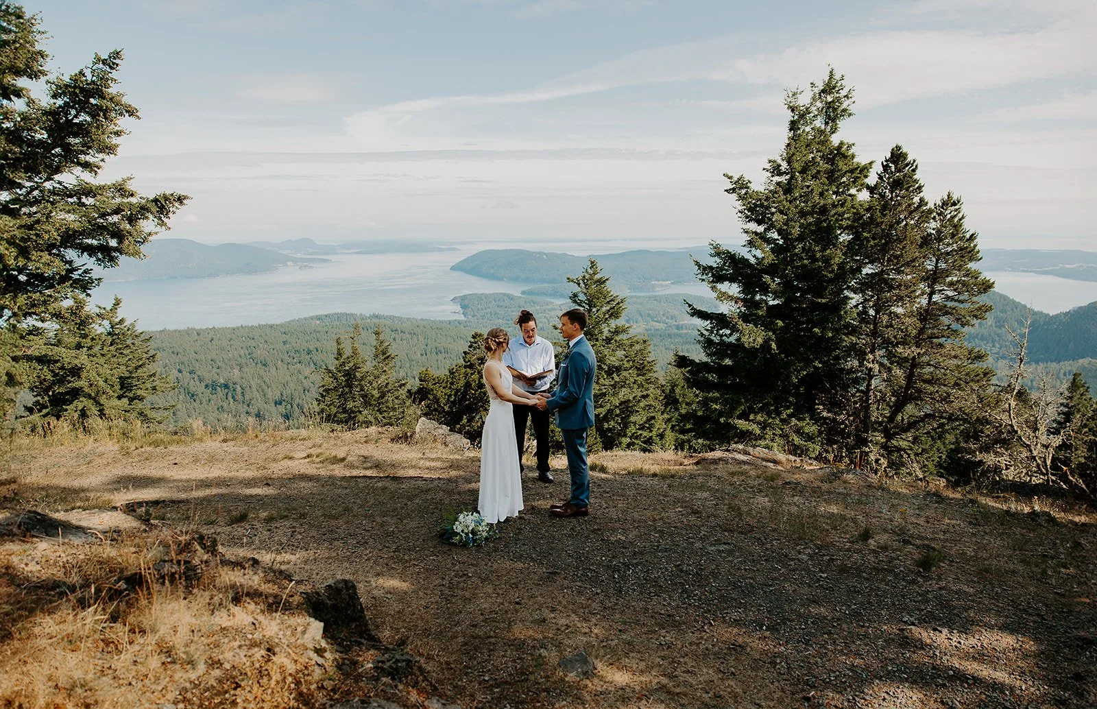 couple standing at Little Summit Overlook in Moran State Park during elopement ceremony