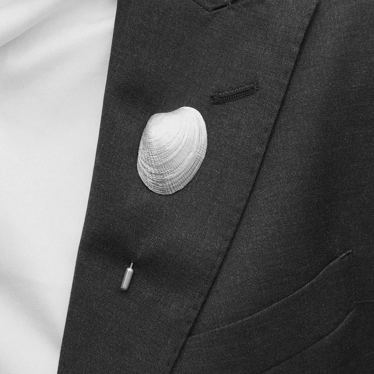 Alfiler para solapa.