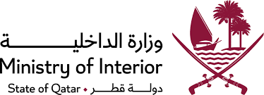 Logo of the Ministry of Interior of Qatar with Arabic and English text, featuring a sailboat, palm trees, and crossed swords.