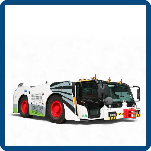 A white airport baggage conveyor belt vehicle with red wheels and black and yellow hazard markings in front, used for transporting luggage.