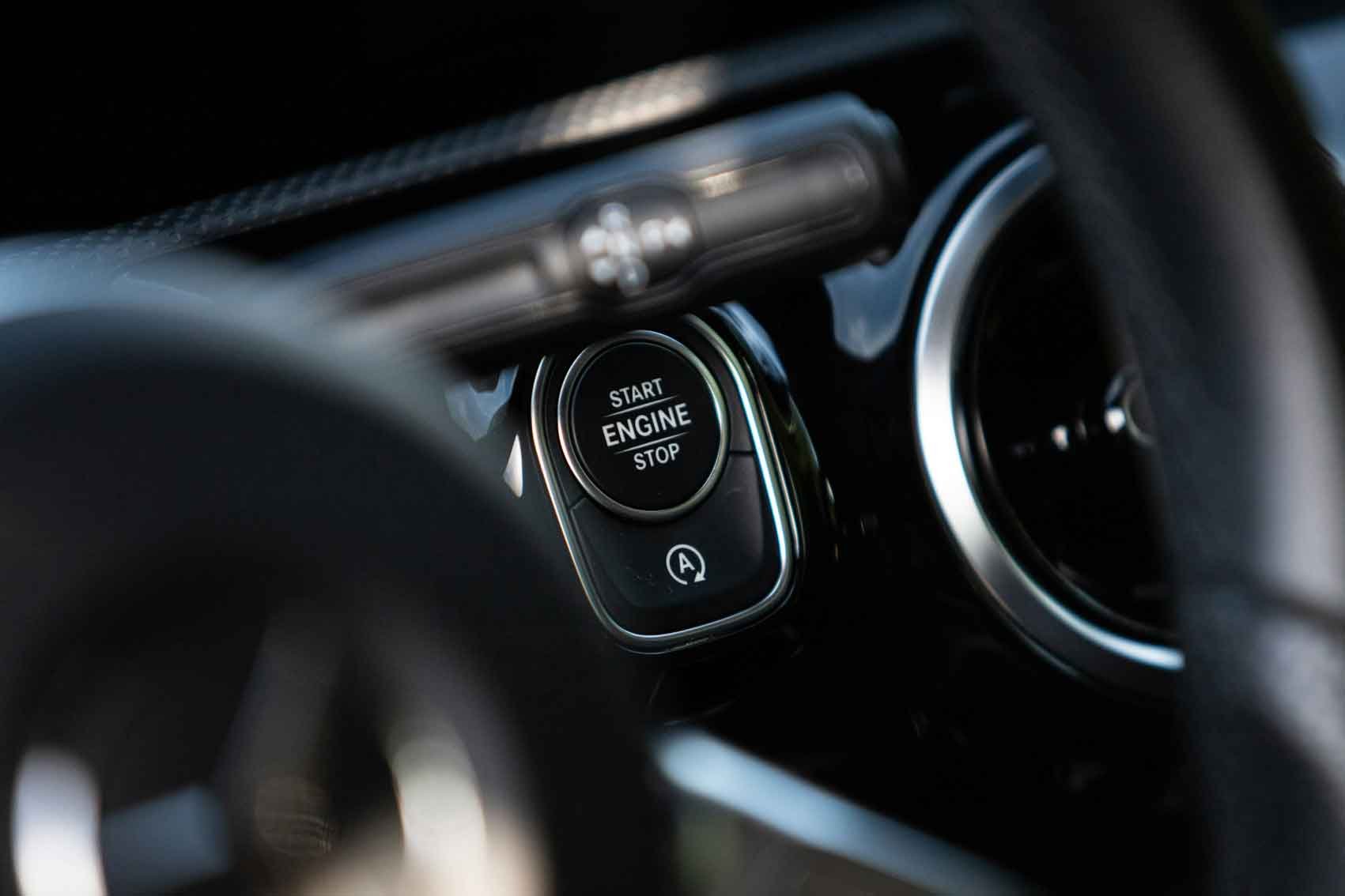 Vehicle start engine button and dashboard controls inspected during gearbox diagnostics by Planet Gears UK Cambridge specialists