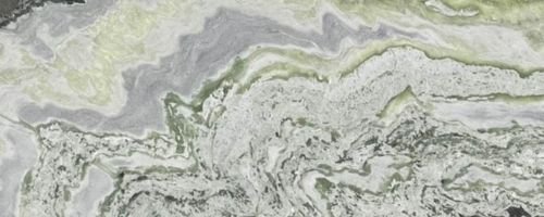 Close-up of a marbled stone surface with shades of gray, white, and hints of green.