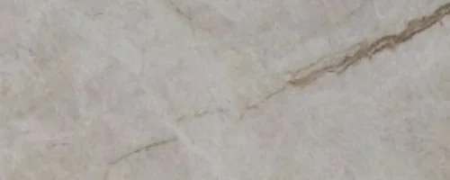 Close-up of a light-colored marble surface with natural veining.