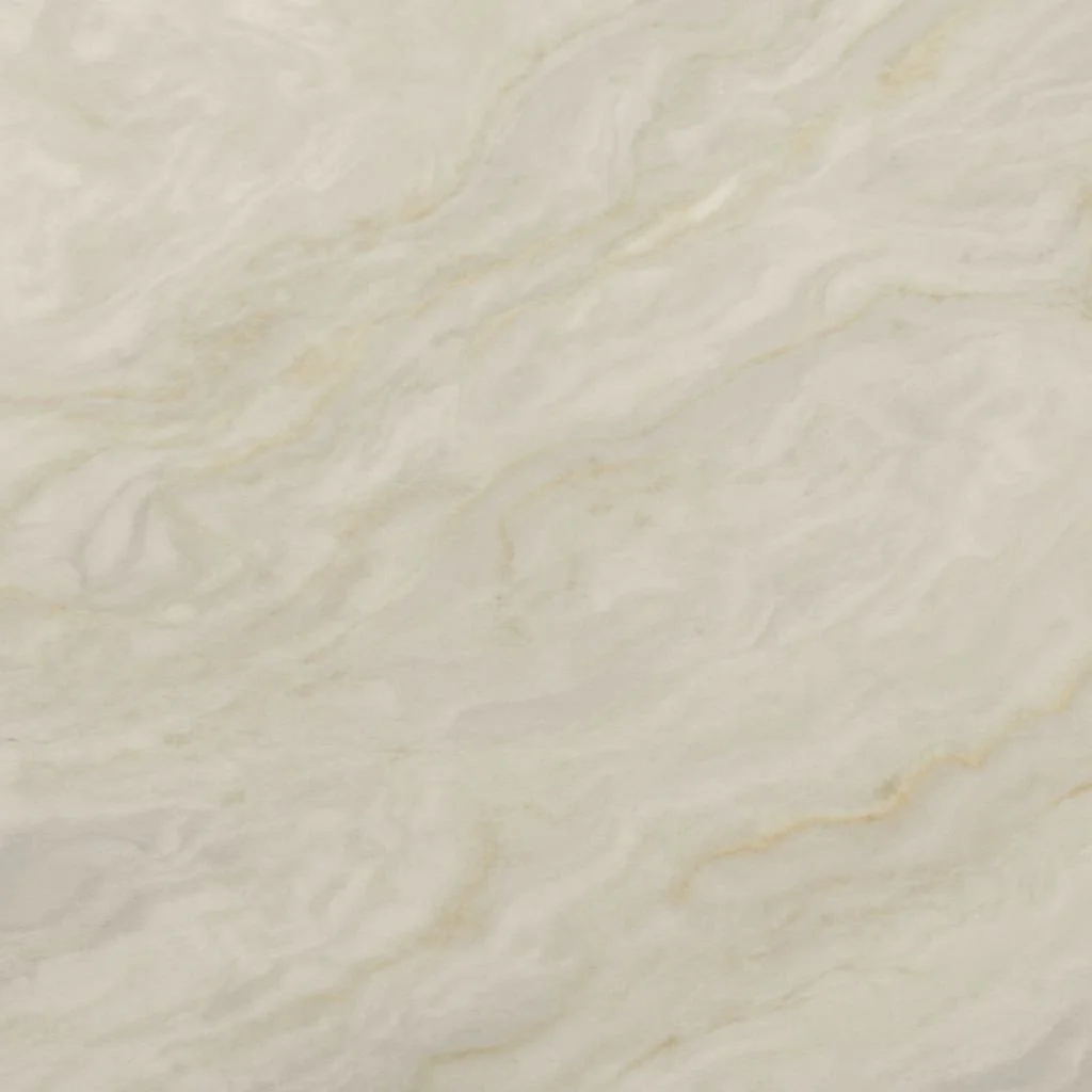 Close-up of a light-colored marble or stone surface with subtle veining.