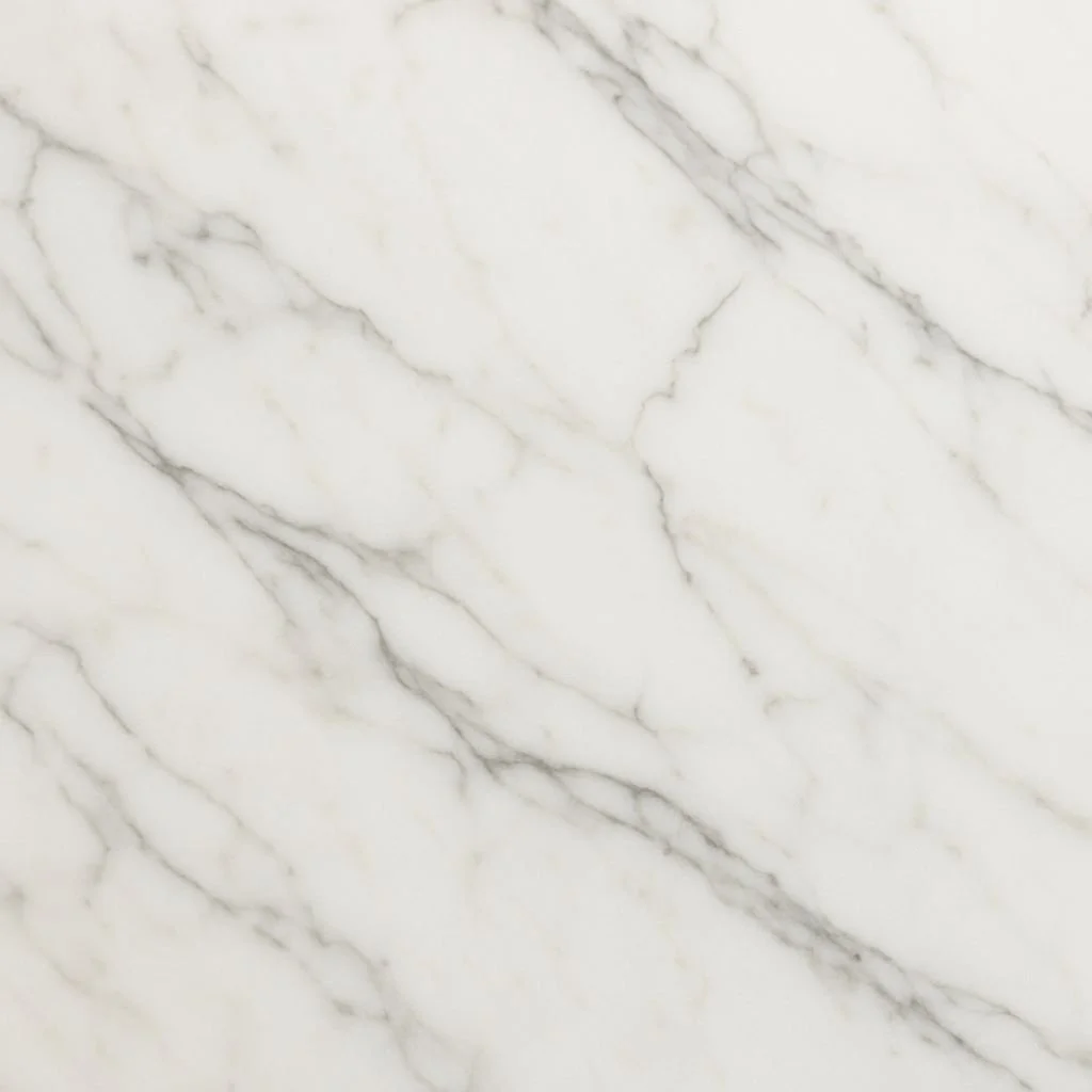 A close-up of white marble with grey veining.