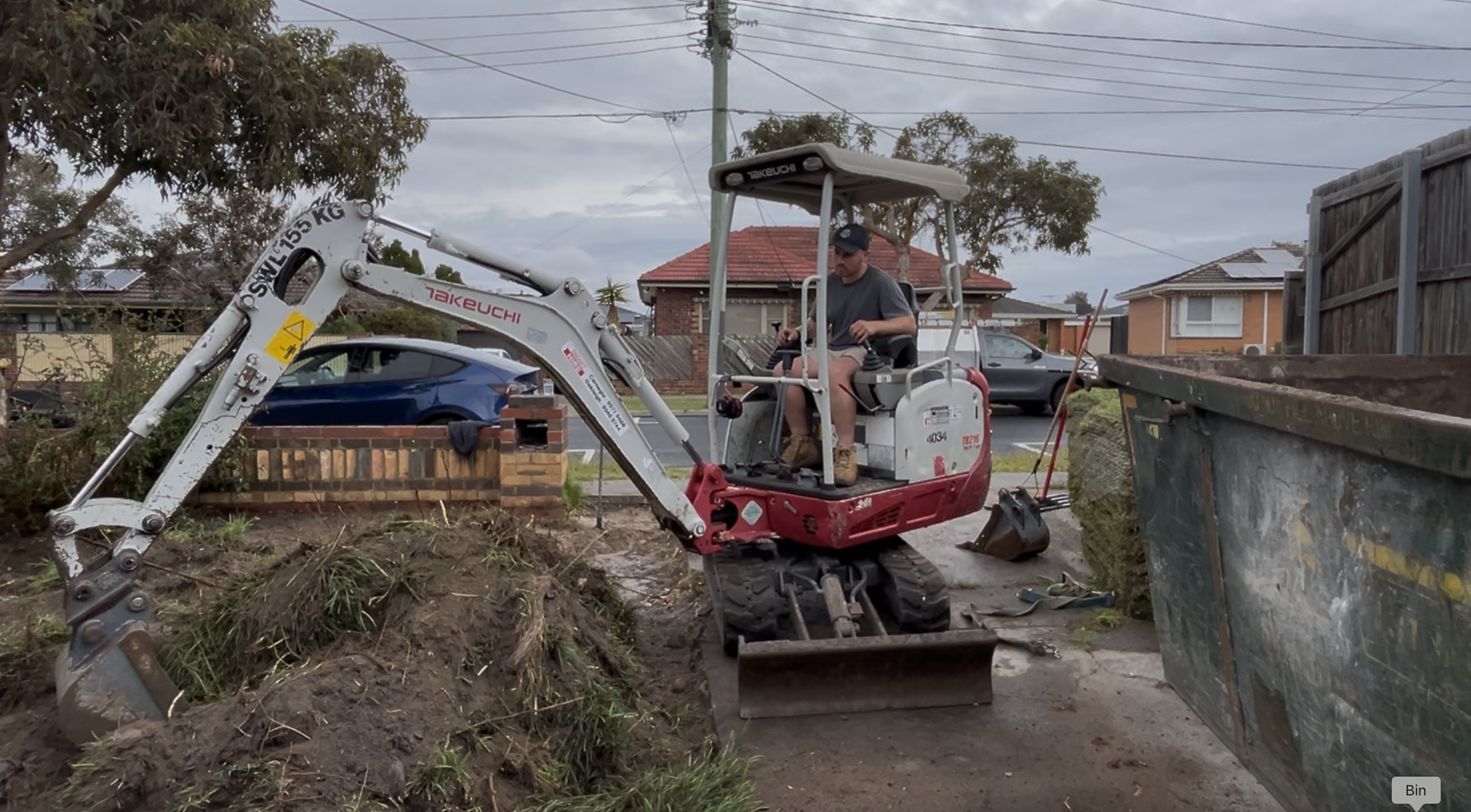 Prepping the area by removing the existing turf and levelling out the profile.