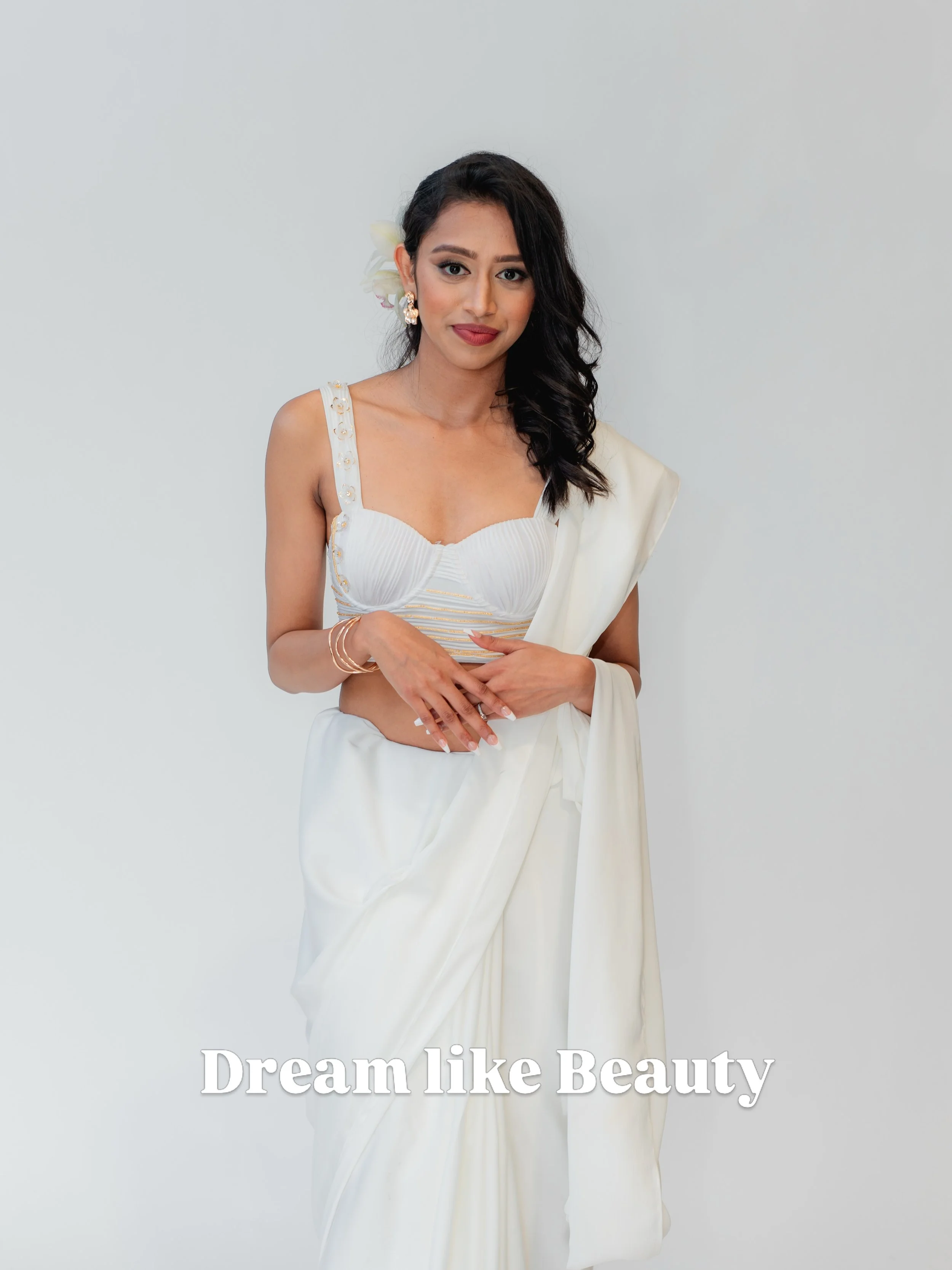 Dreamlike Beauty 
Soft &amp; Effortless

For the bride who dreams of minimal dainty touch. Delicate drapes, soft glam, and an all-white moment that feels straight out of a dream. A look designed for the bride who wants simplicity to feel unforgettabl