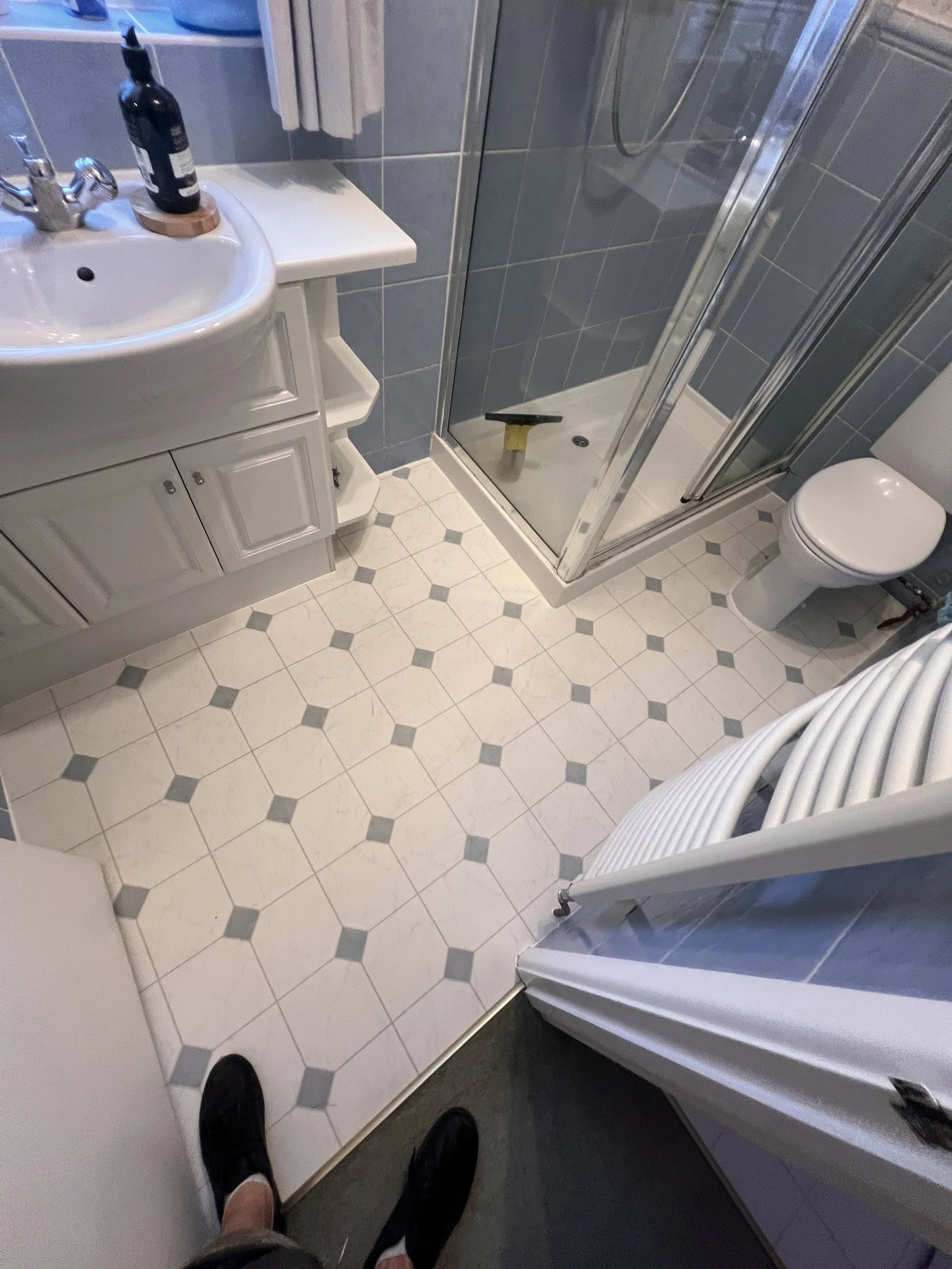 Tile Effect vinyl fitted in En-suite Stroud