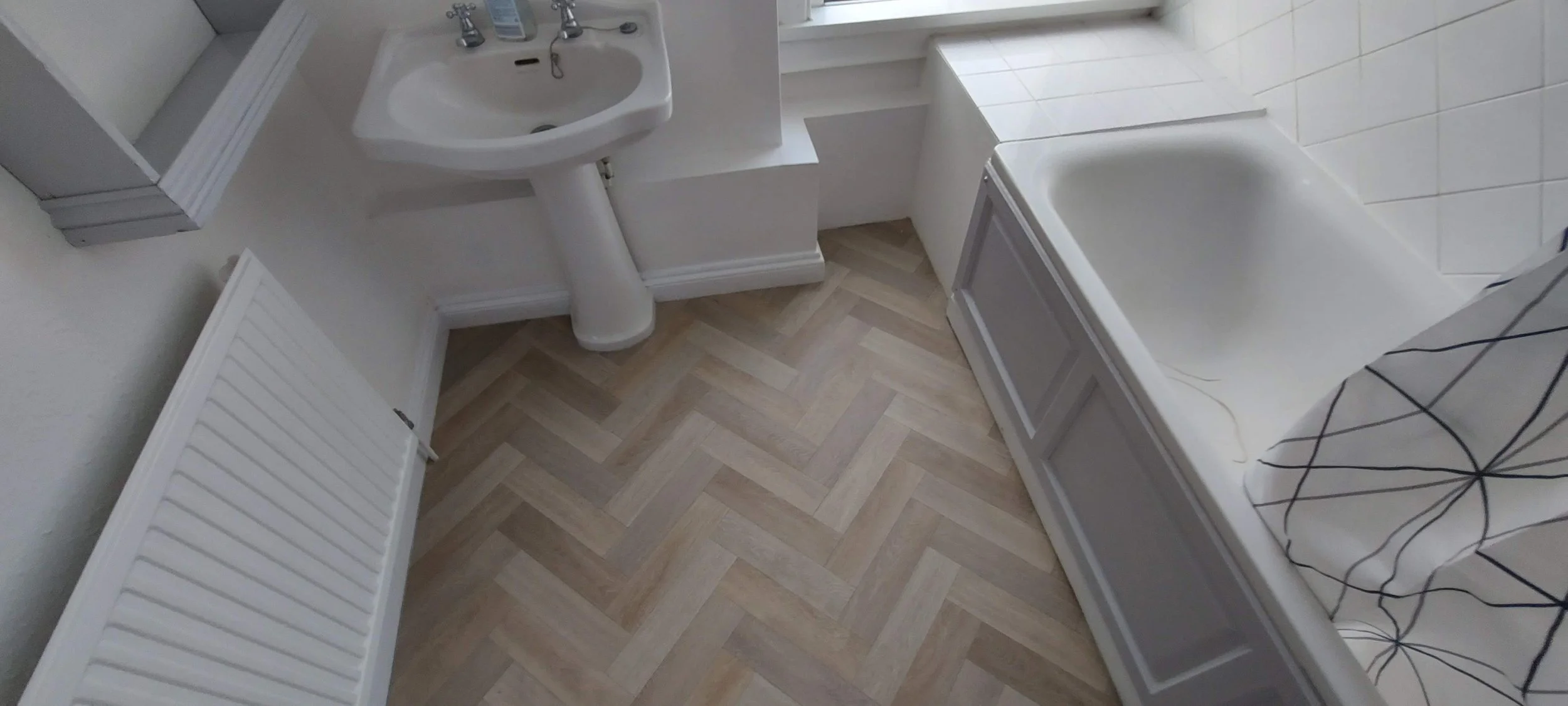Herringbone Style sheet vinyl fitted in Stonehouse 