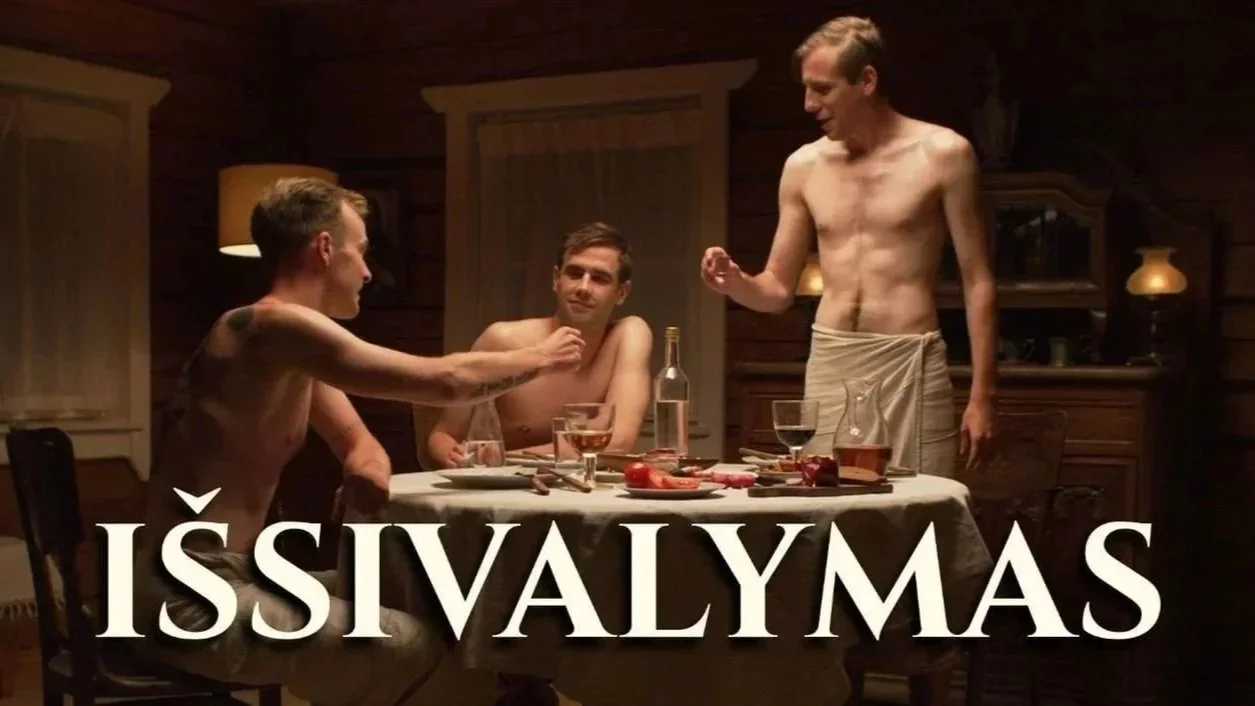 Three shirtless men in a warmly lit dining room, sitting at a table set with food and drinks, with the Greek phrase 'Kalimera' superimposed at the bottom.