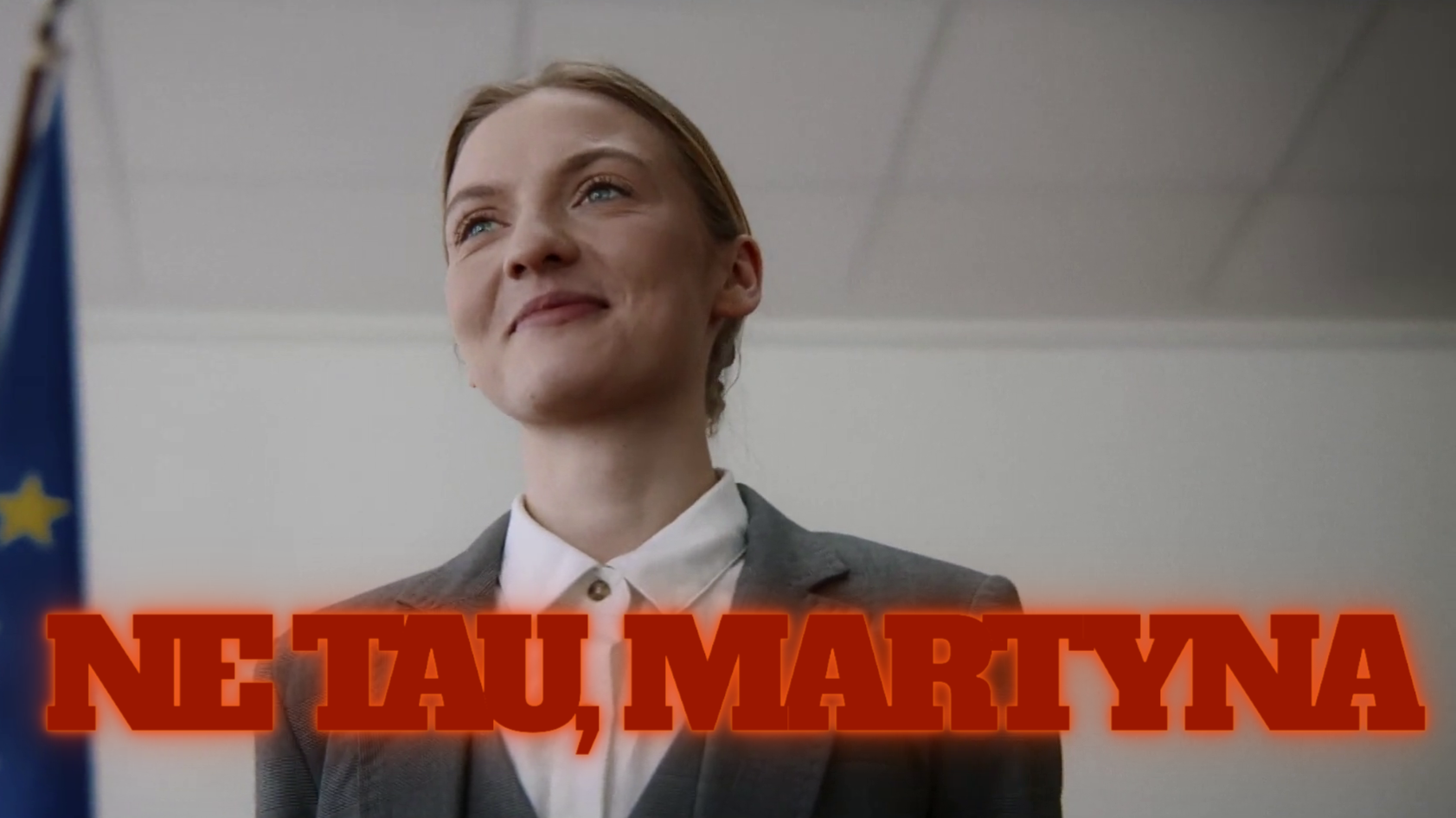 A woman in a gray business suit with a white shirt, standing in front of a European Union flag, smiling confidently. Red text in Romanian overlaid on the image reads 'NE TAU, MARȚYNA'.