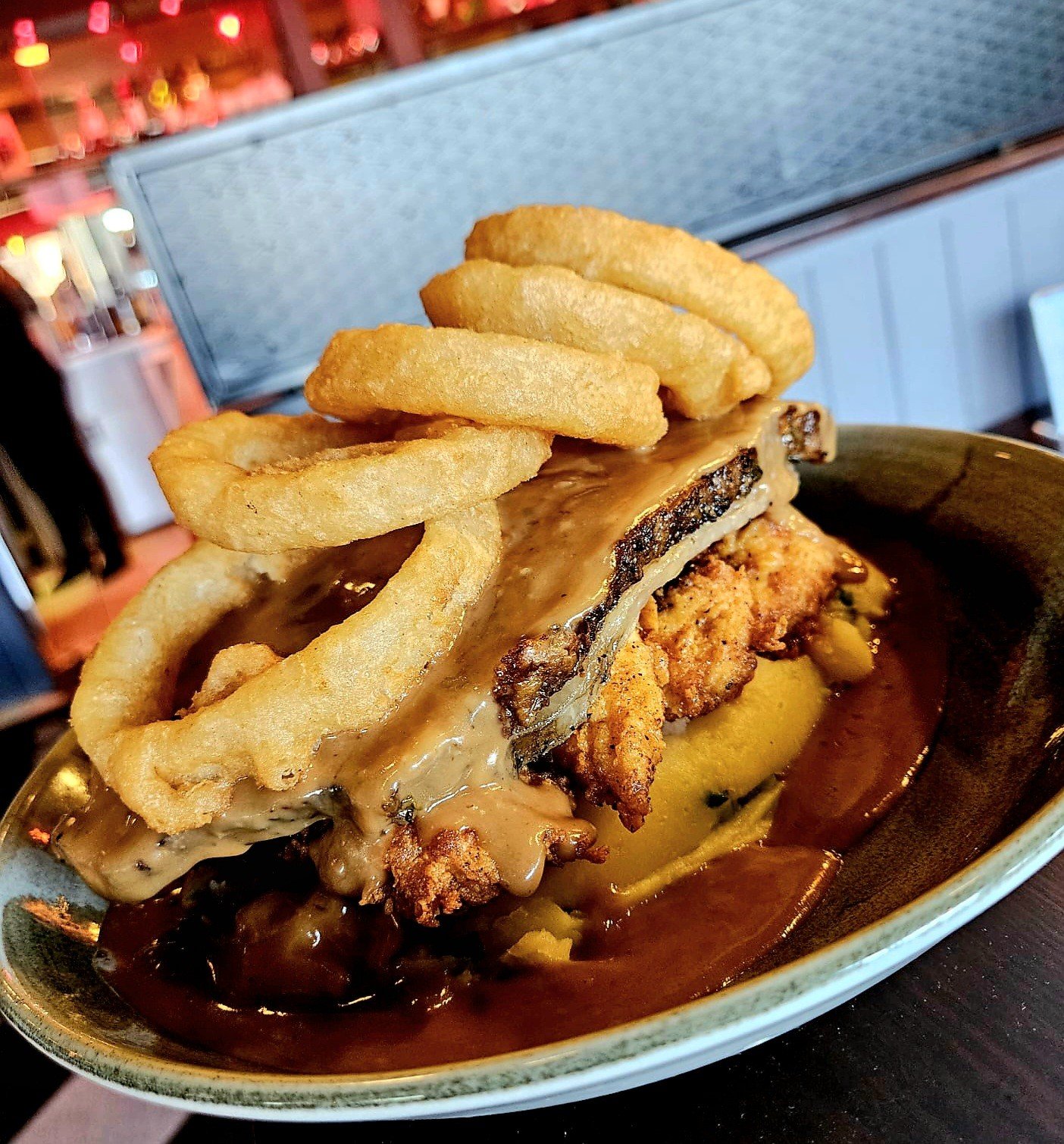 💪 BIG STACK 💪

Slow roasted sirloin of beef, fried chicken, creamy champ, peppercorn sauce, and onion rings 👌

Absolutely beast of a special available now from #sugarraysboucher 🩶🤍🩷

Open from 10am until late every day ✨️ 

No need to book 👏👏