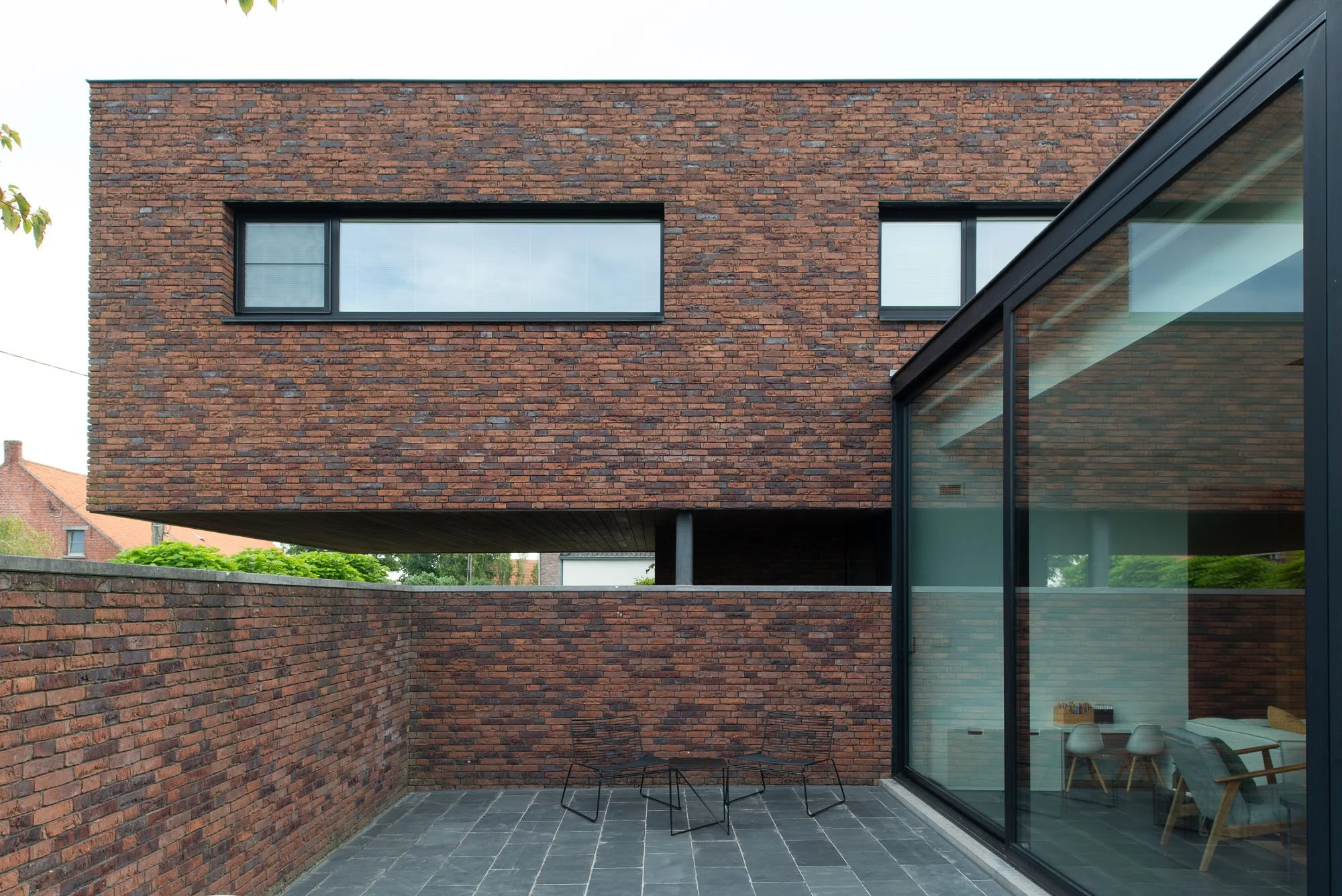 Binnenplaats moderne woning ontworpen door architectenbureau Gert Anthonissen Architect te Wuustwezel