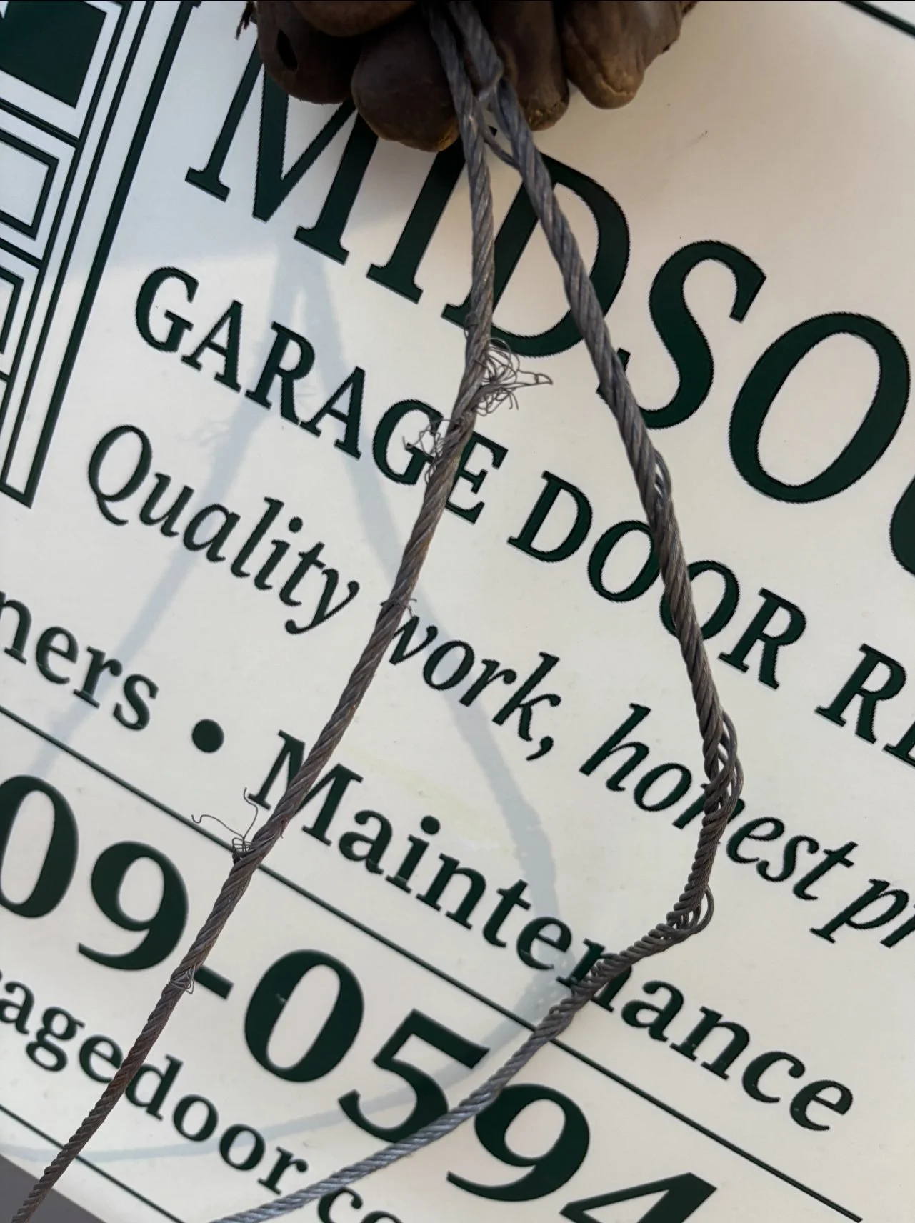 Frayed overhead door cables