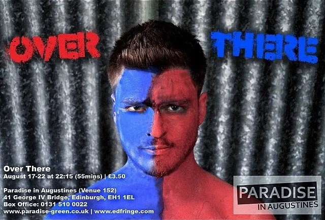 A man's face is painted half blue on the left side and half red on the right side, with the word 'OVER' in red above the blue side and the word 'THERE' in blue above the red side, creating the phrase 'Over There'. The background is metallic silver curtains, and there is text at the bottom with event and contact information.