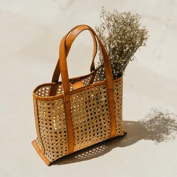 Tan leather tote with cane woven panel by Pink Haley (Magnolia style).png