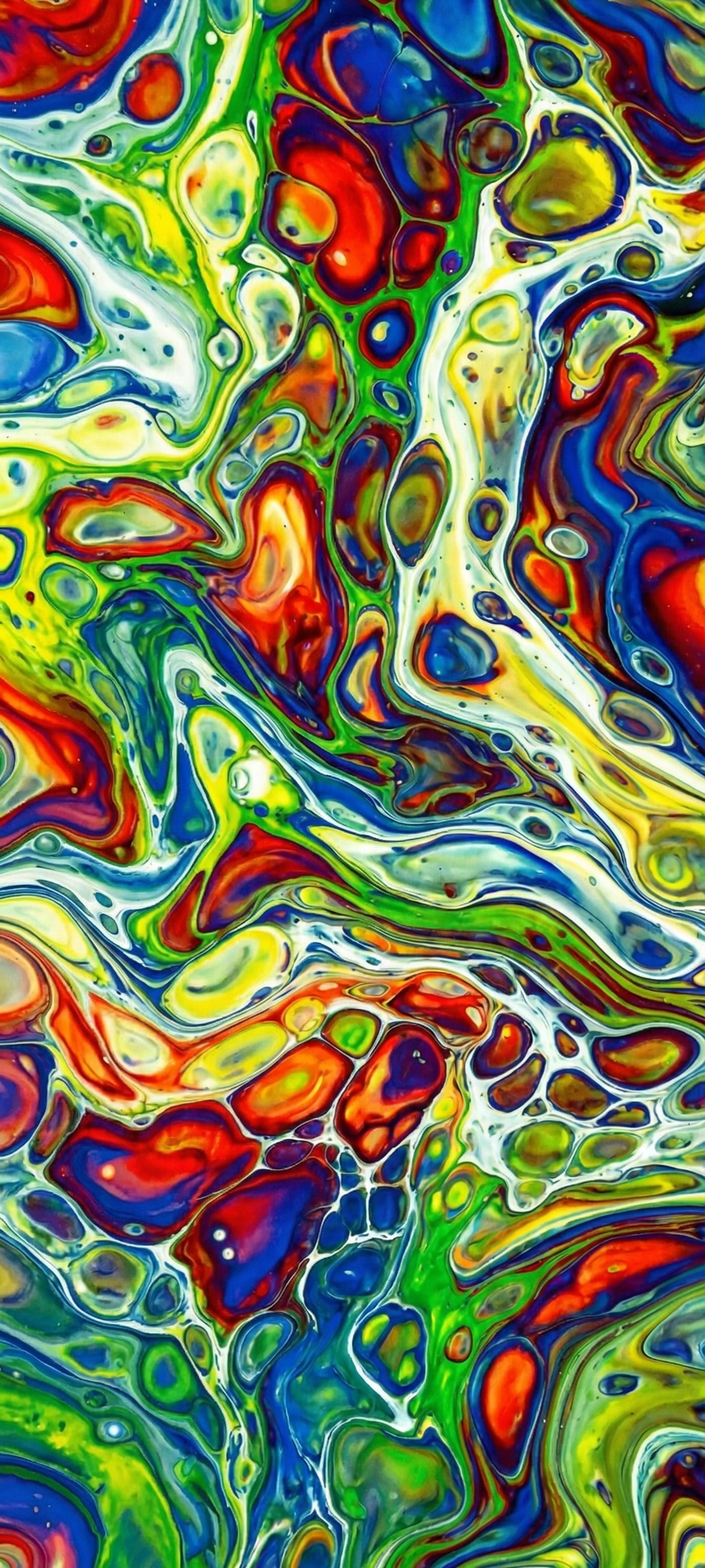 Colorful abstract paint swirl with vibrant reds, blues, greens, and whites.