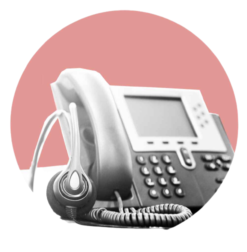 A landline phone with a headset, placed in a circle with a pink background.