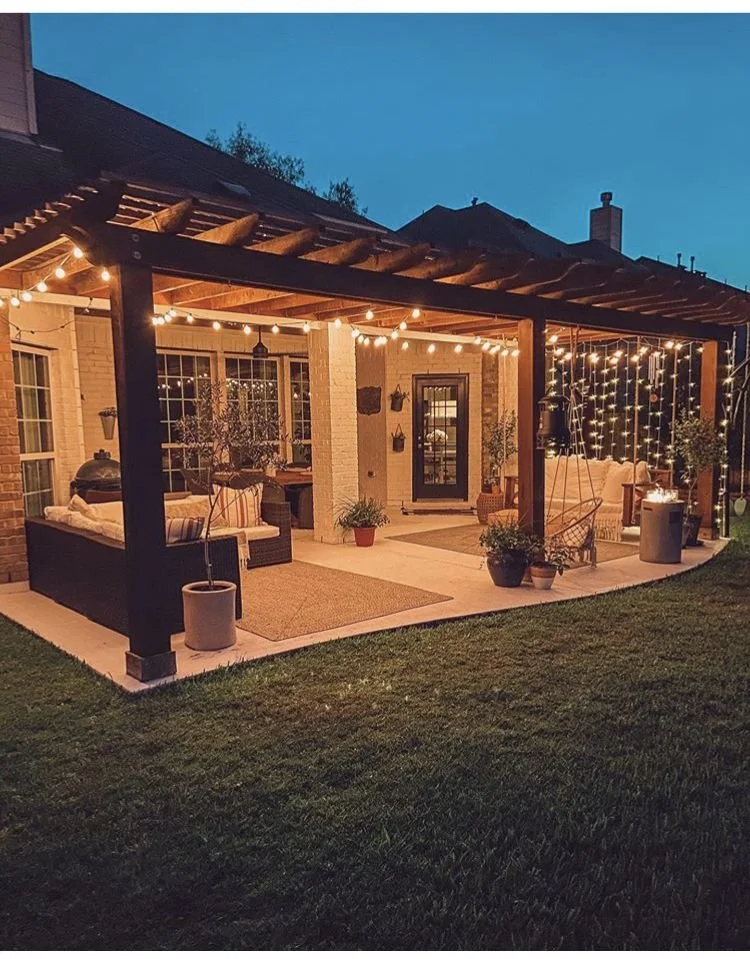 Backyard pergola and patio renovation creating a cozy outdoor living space at an existing home in East Tennessee.