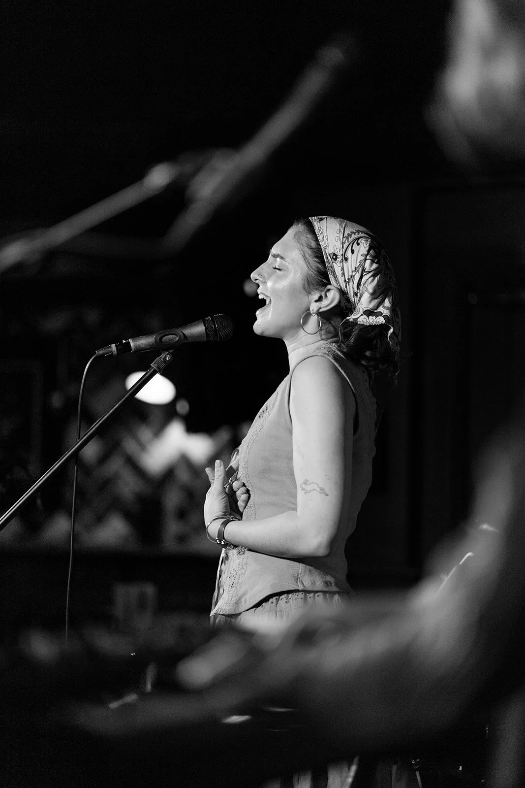 Ella Crow portrait singing shot
