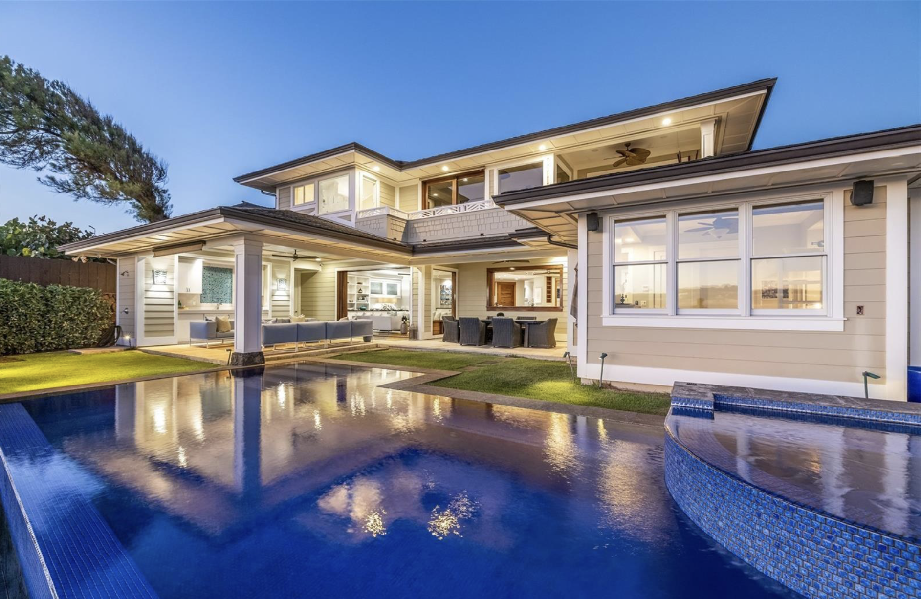 Luxury modern house with outdoor pool, patio area, and interior lighting visible through large windows at dusk.and premium architectural detail. Perfect for developers, agents, and designers.