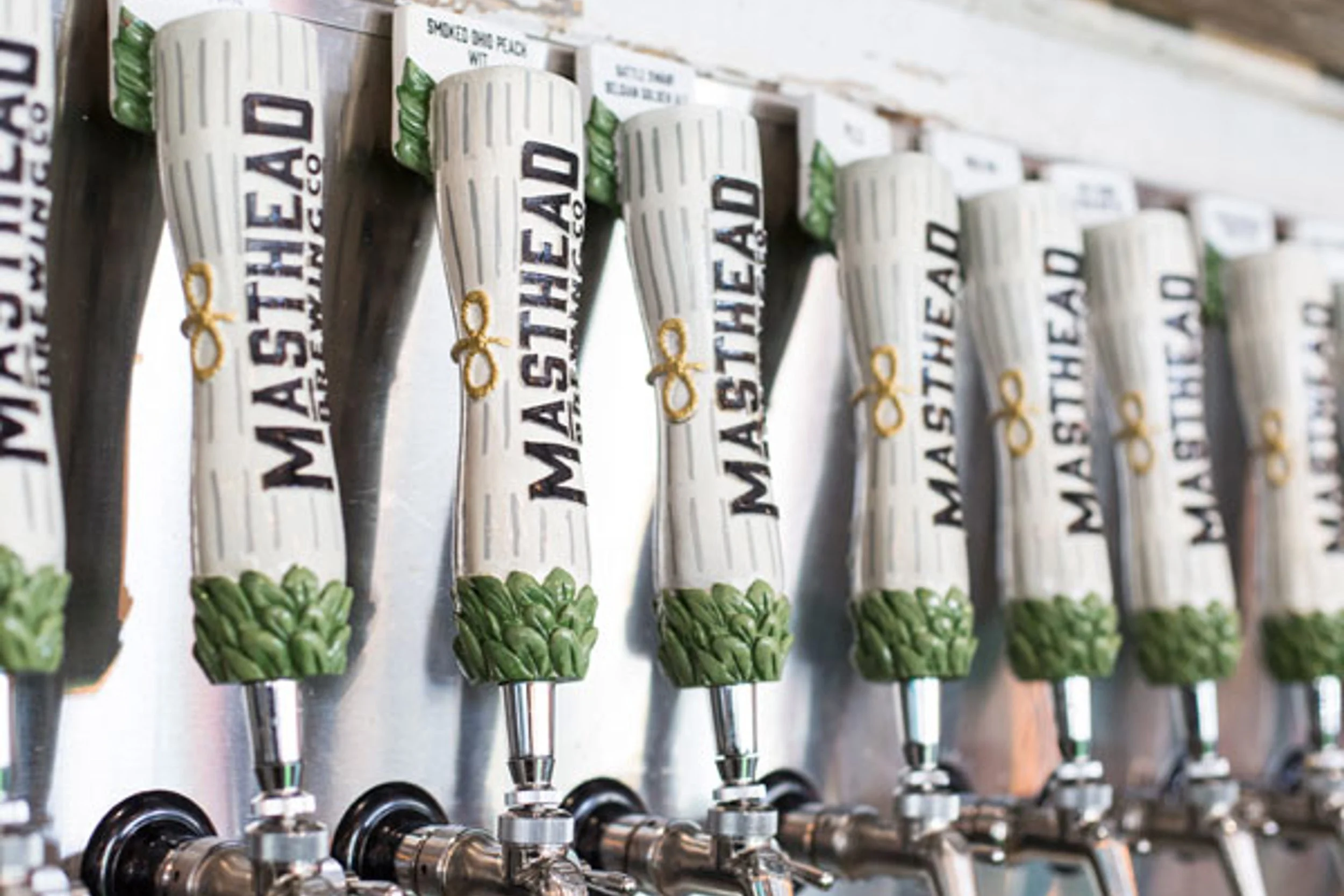 A row of tap handles