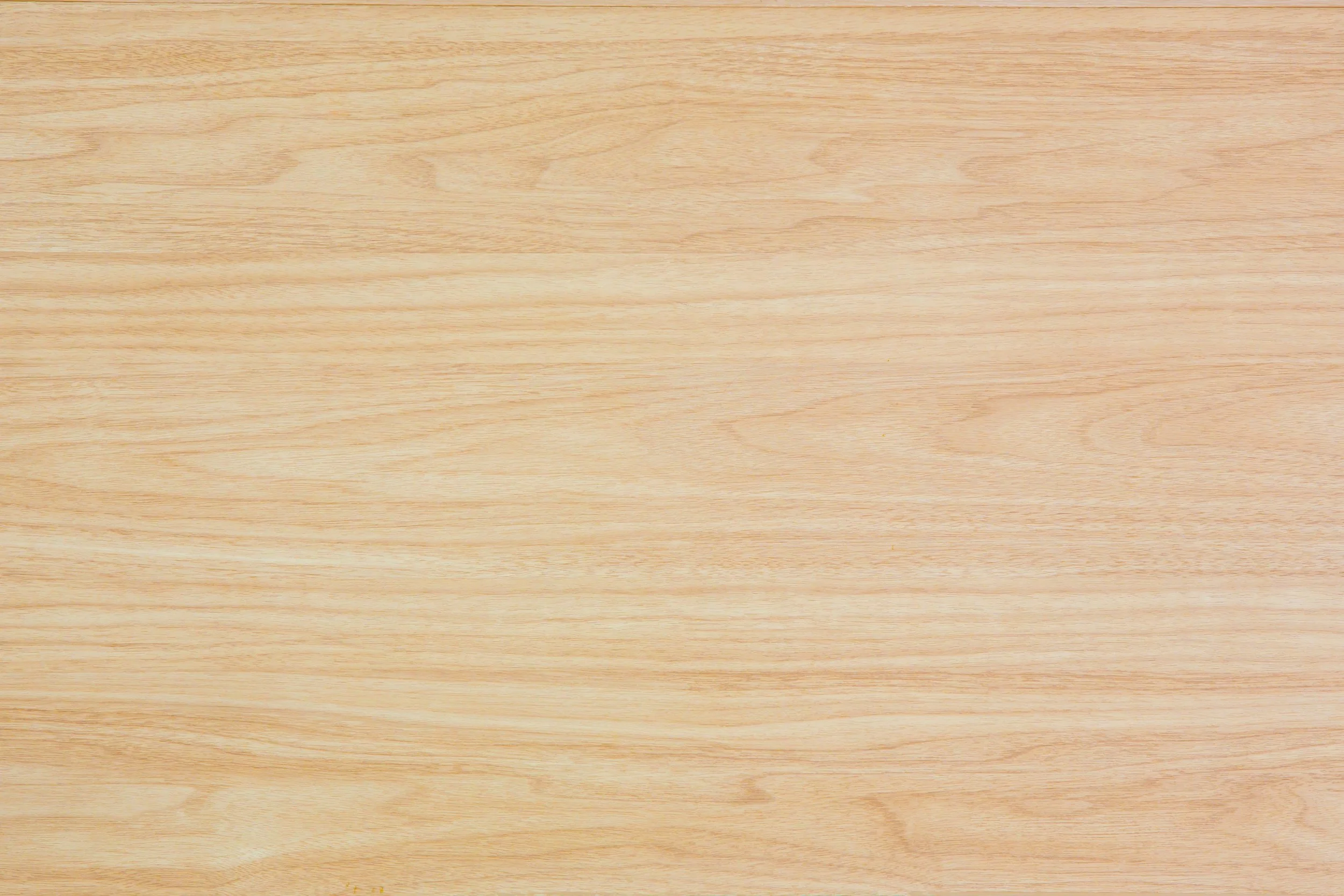 Light-colored wooden surface with visible grain patterns.