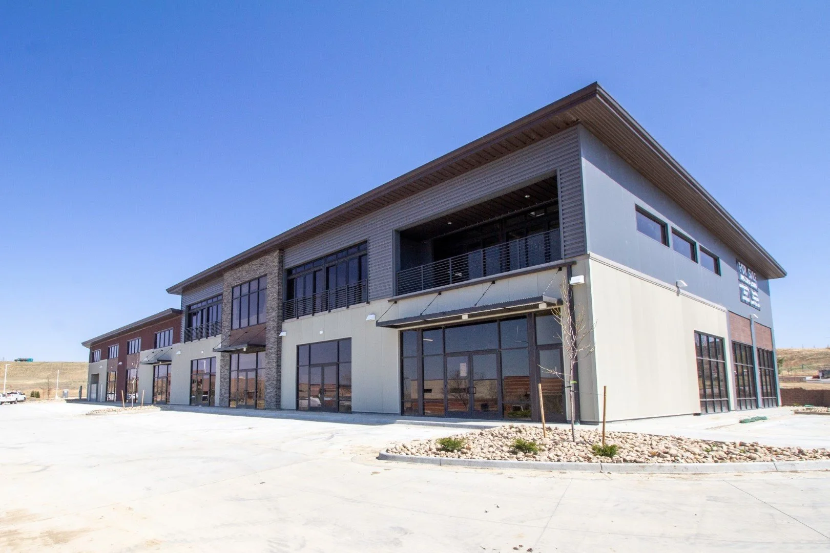 Exterior view of Own It Flex, modern office and warehouse flex condos in Lafayette, Colorado.