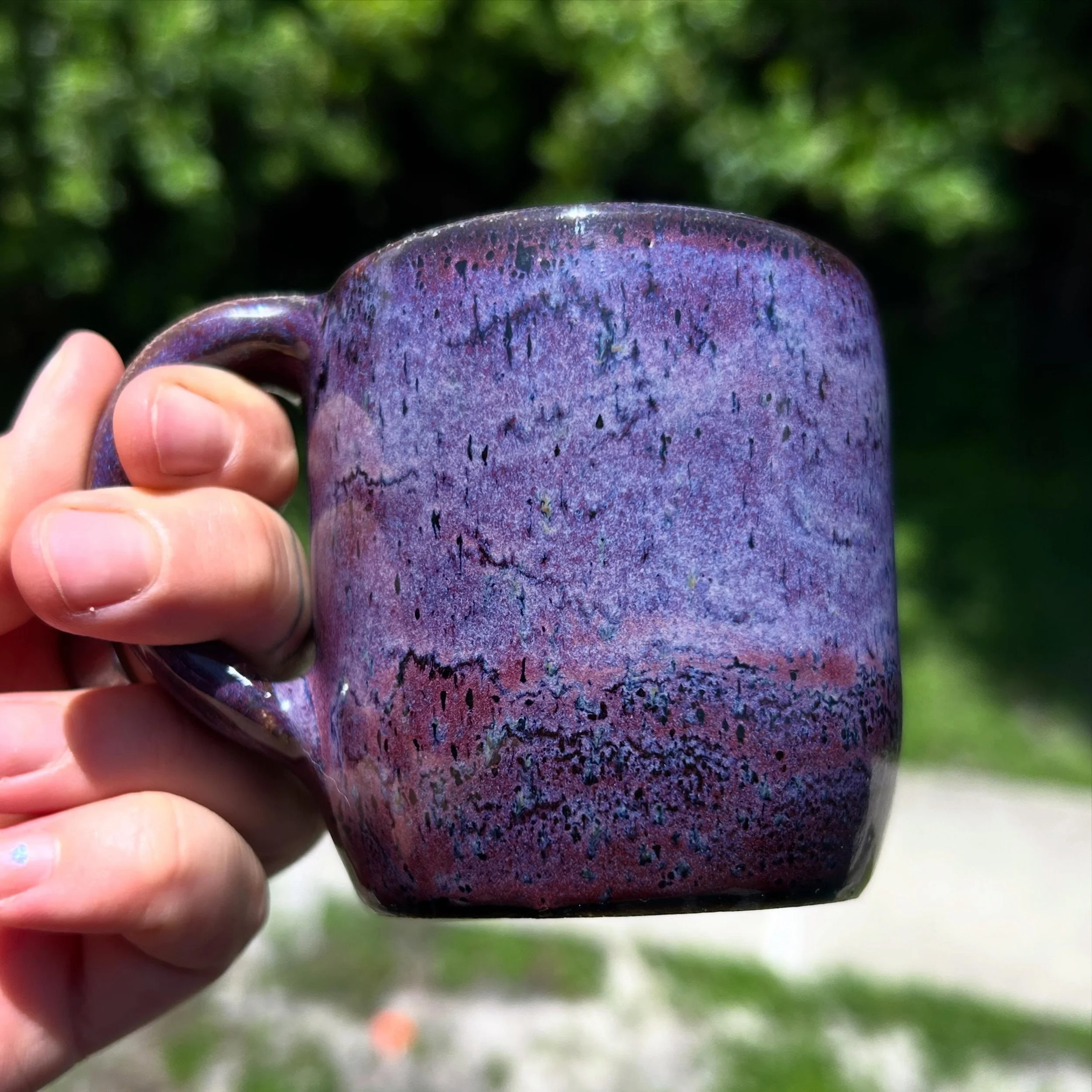 Chemistry is weird. Same mug, same glaze only it was a refire on a mug with different glazes on each side #ceramics #artist #pottery