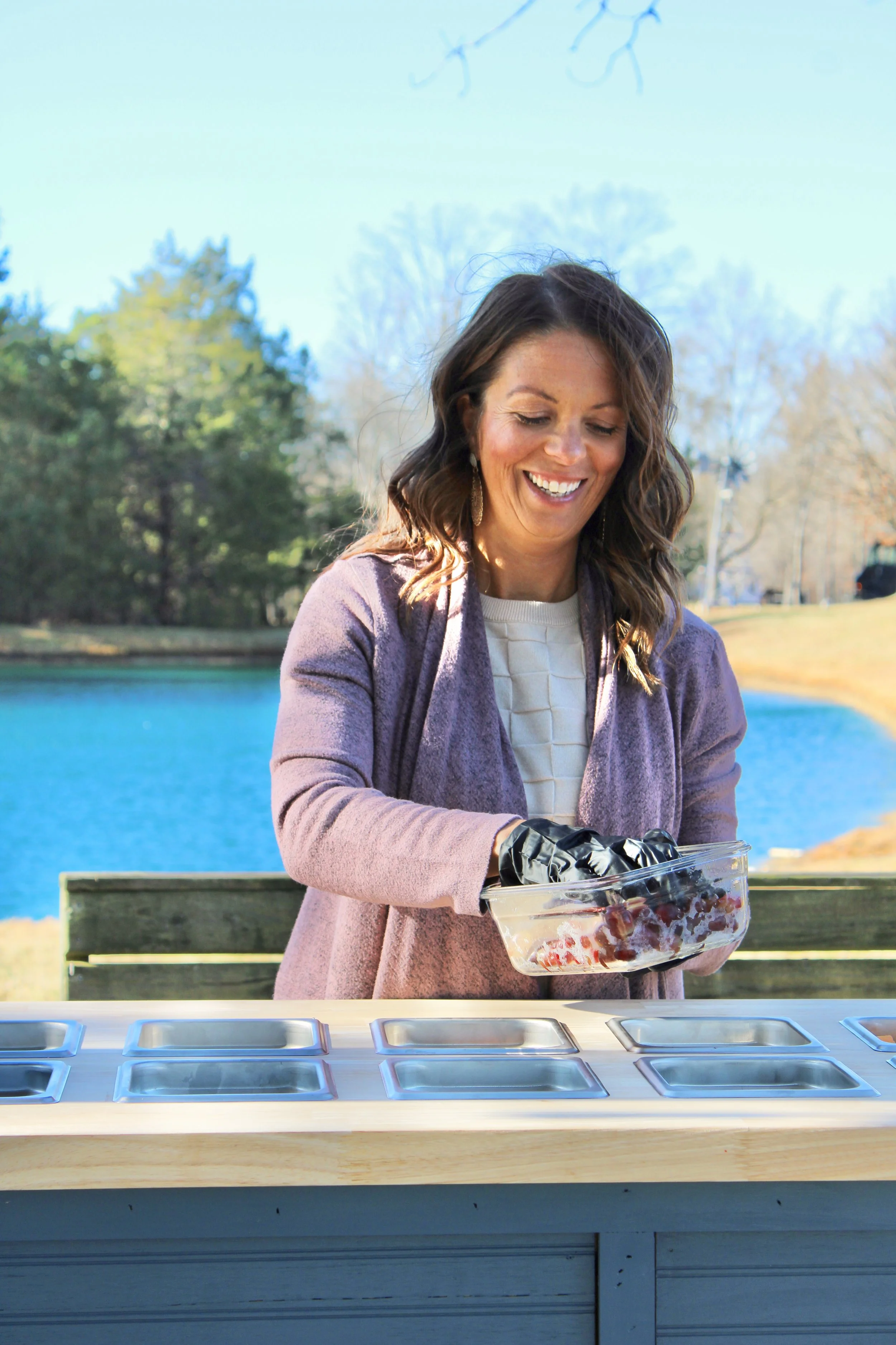 Amber preparing her mobile charcuterie cart for The Charcuterie Chics near Durham NC