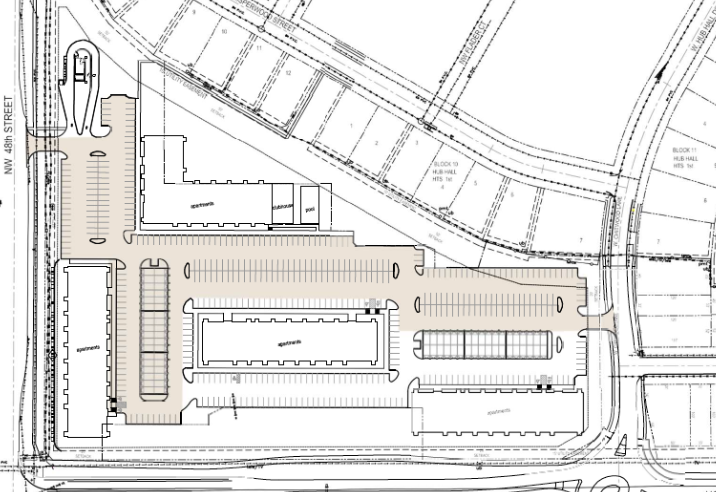 A black and white site plan of a commercial development with parking lots, buildings, and surrounding streets.