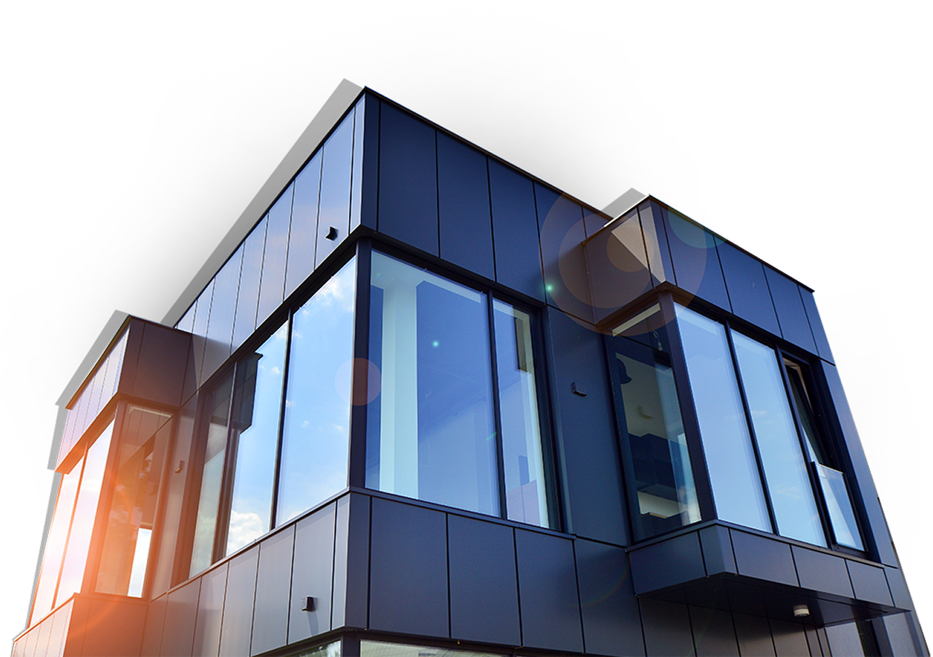 Modern building with large glass windows reflecting a blue sky with clouds, against a black background with lens flare.