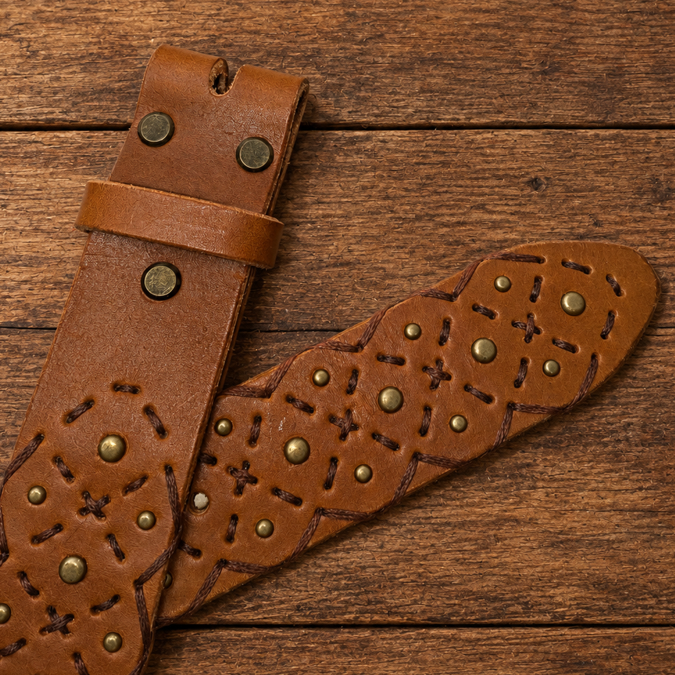Rustic+Riveted+Leather+Belt+on+Wood.png
