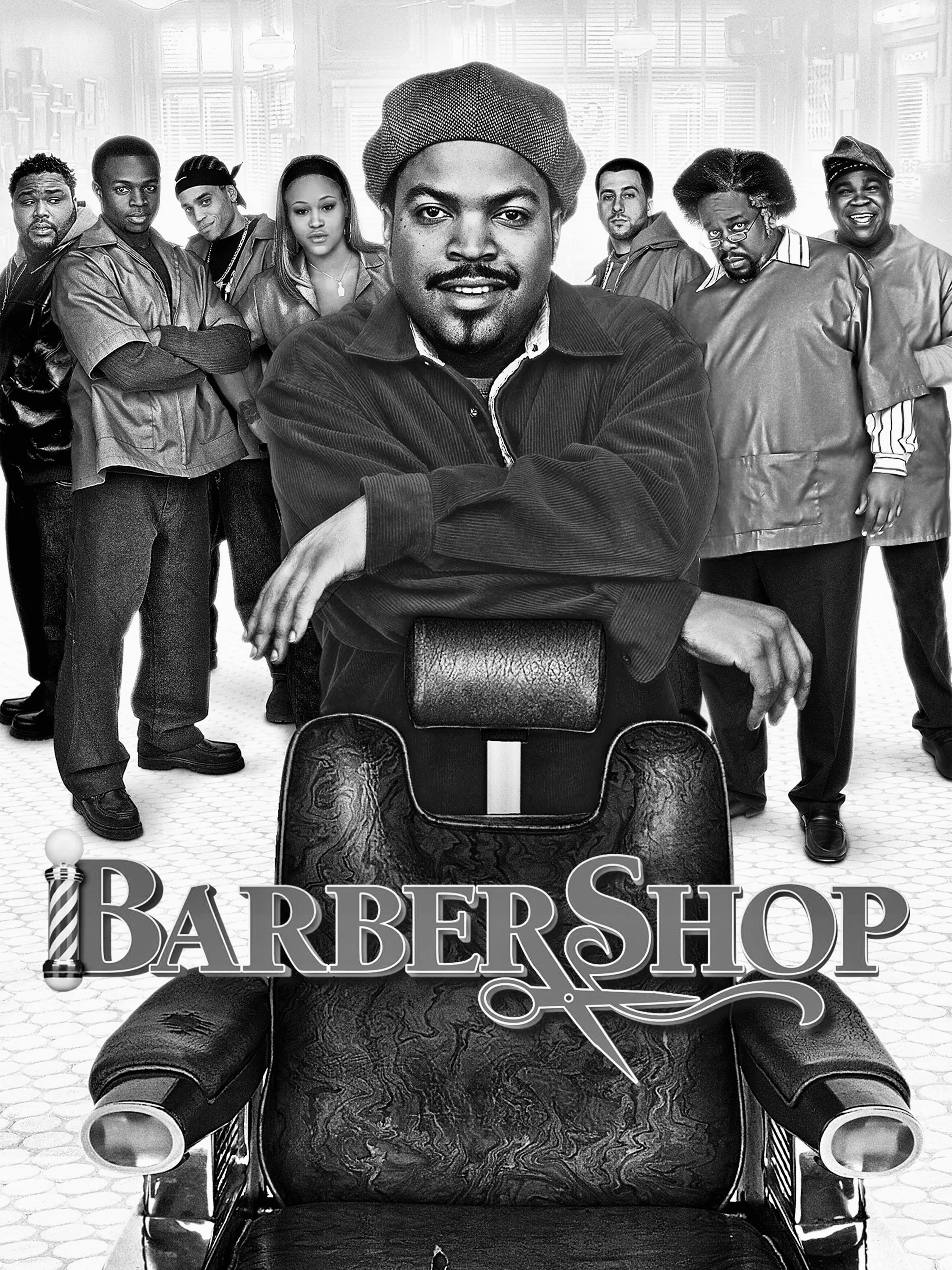 Un groupe de personnes dans un salon de coiffure avec le logo 'Barbershop' en premier plan.