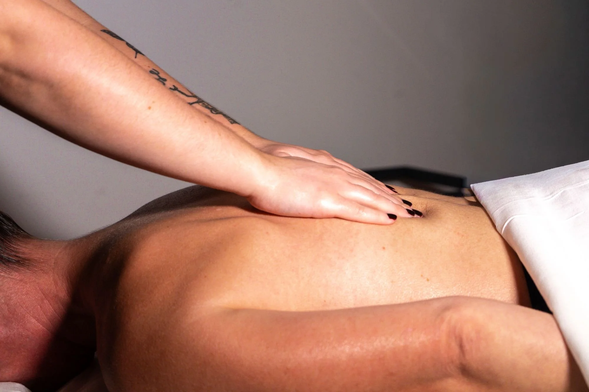     Full-body customized massage therapy in a private spa treatment room