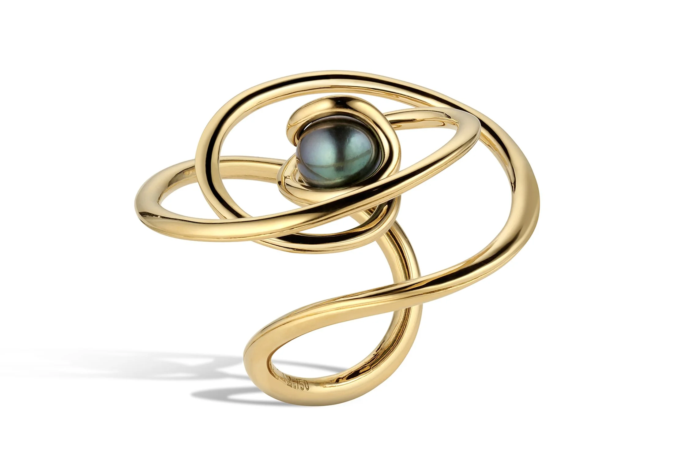 Gold ring with a black pearl centerpiece and delicate swirling design.
