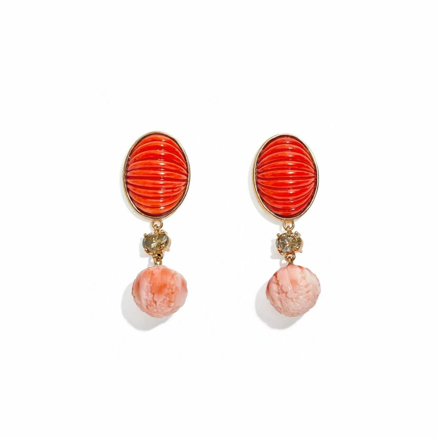 Pair of ornate earrings with red, pink, and clear gemstones set in gold, featuring oval red stones at the top, a small round diamond-like stone below, and a pink marble-like drop at the bottom.