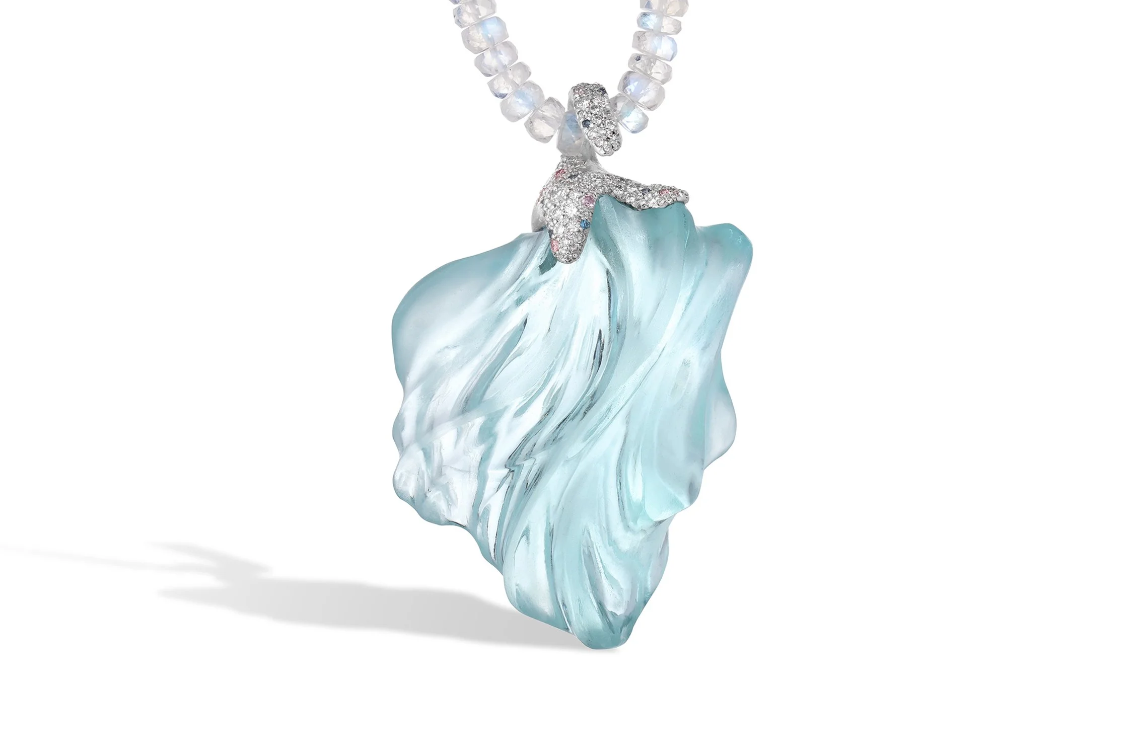 Necklace with a large, light blue glass or crystal pendant resembling a stylized flame or leaf, set on a string of small, round, iridescent white beads.